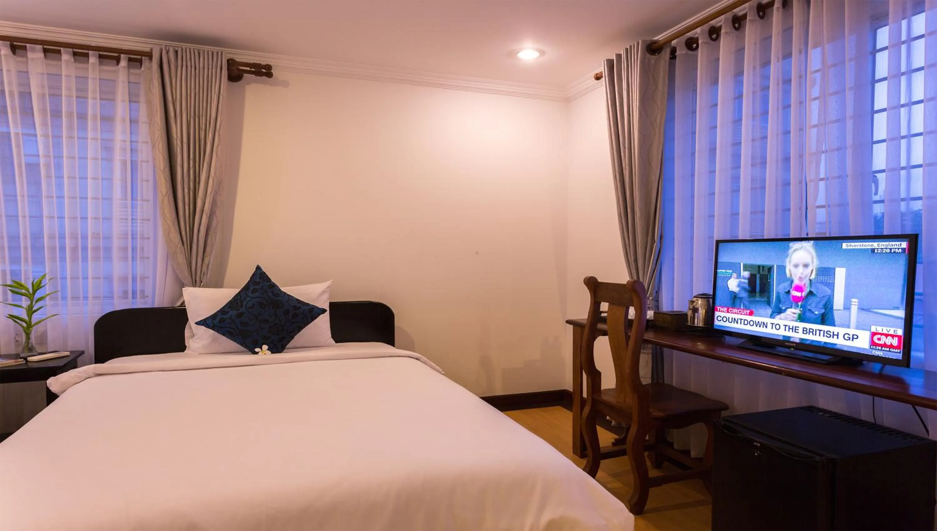 Bed, TV/Entertainment Center in Angkor Ry Boutique