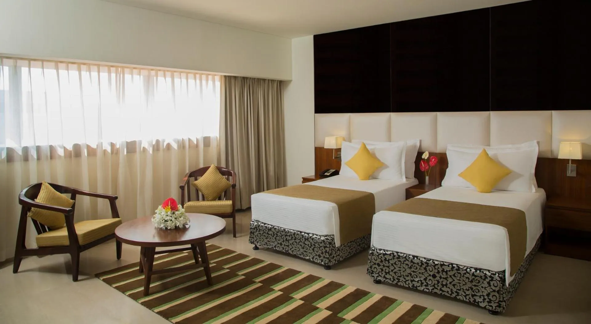 Photo of the whole room, Bed in The Raviz Calicut