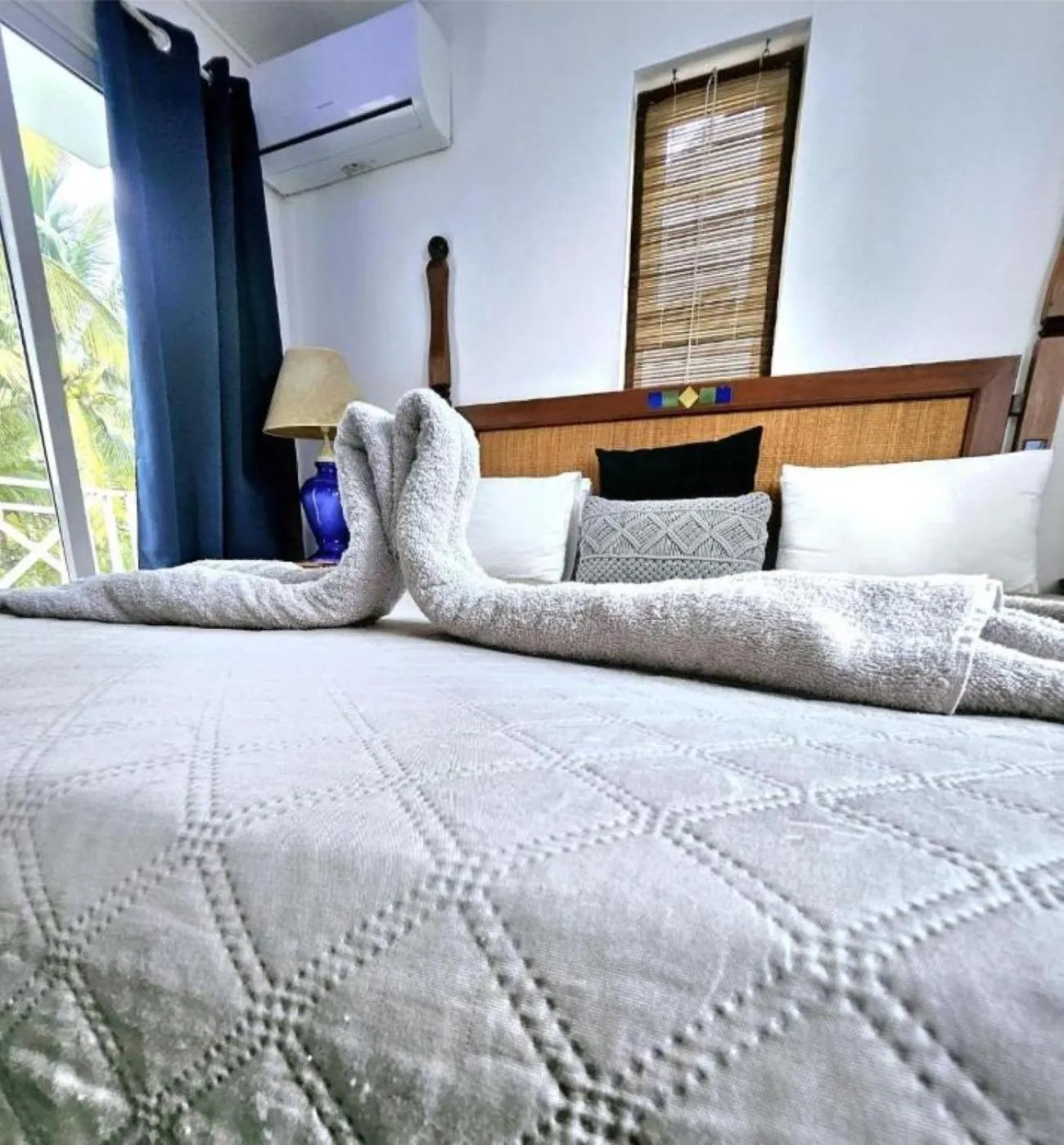 Bed in Ocean Villas Apart Hotel