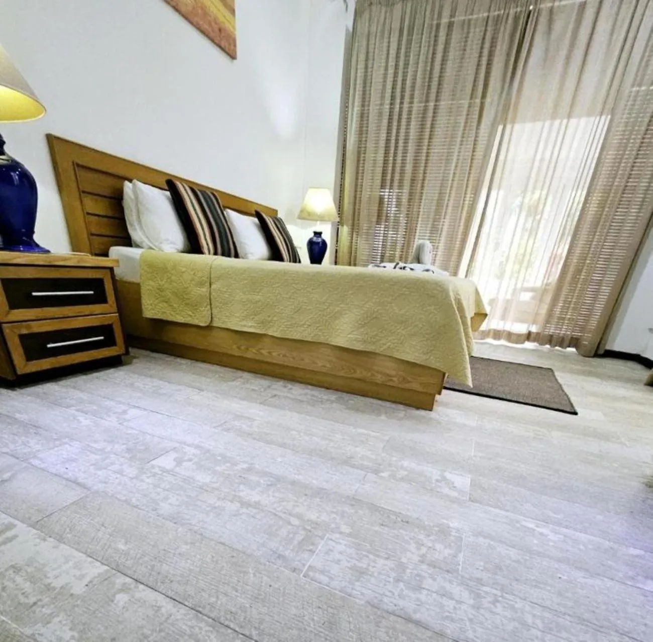 Bed in Ocean Villas Apart Hotel