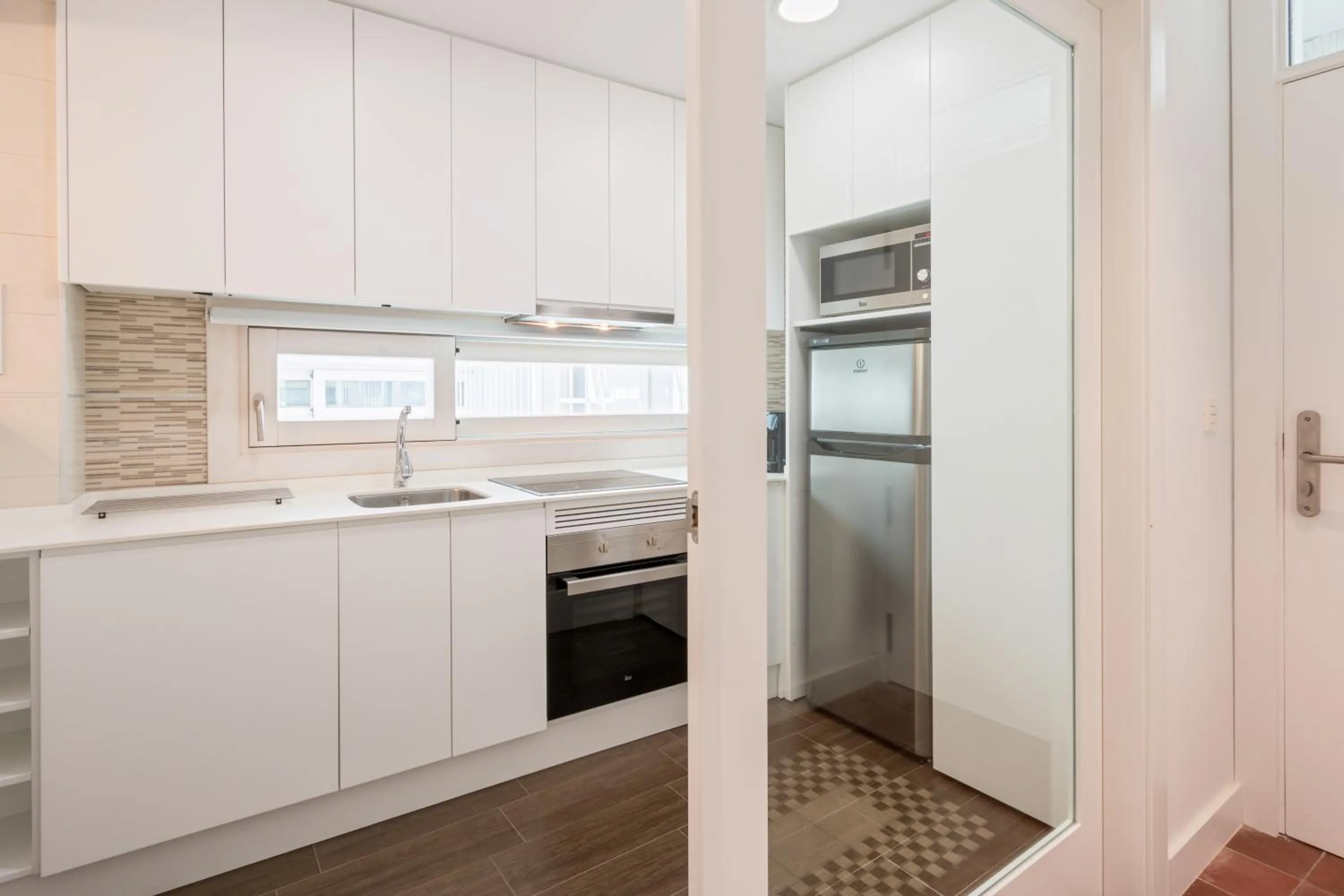 Kitchen or kitchenette in BiBo Suites Oro del Darro