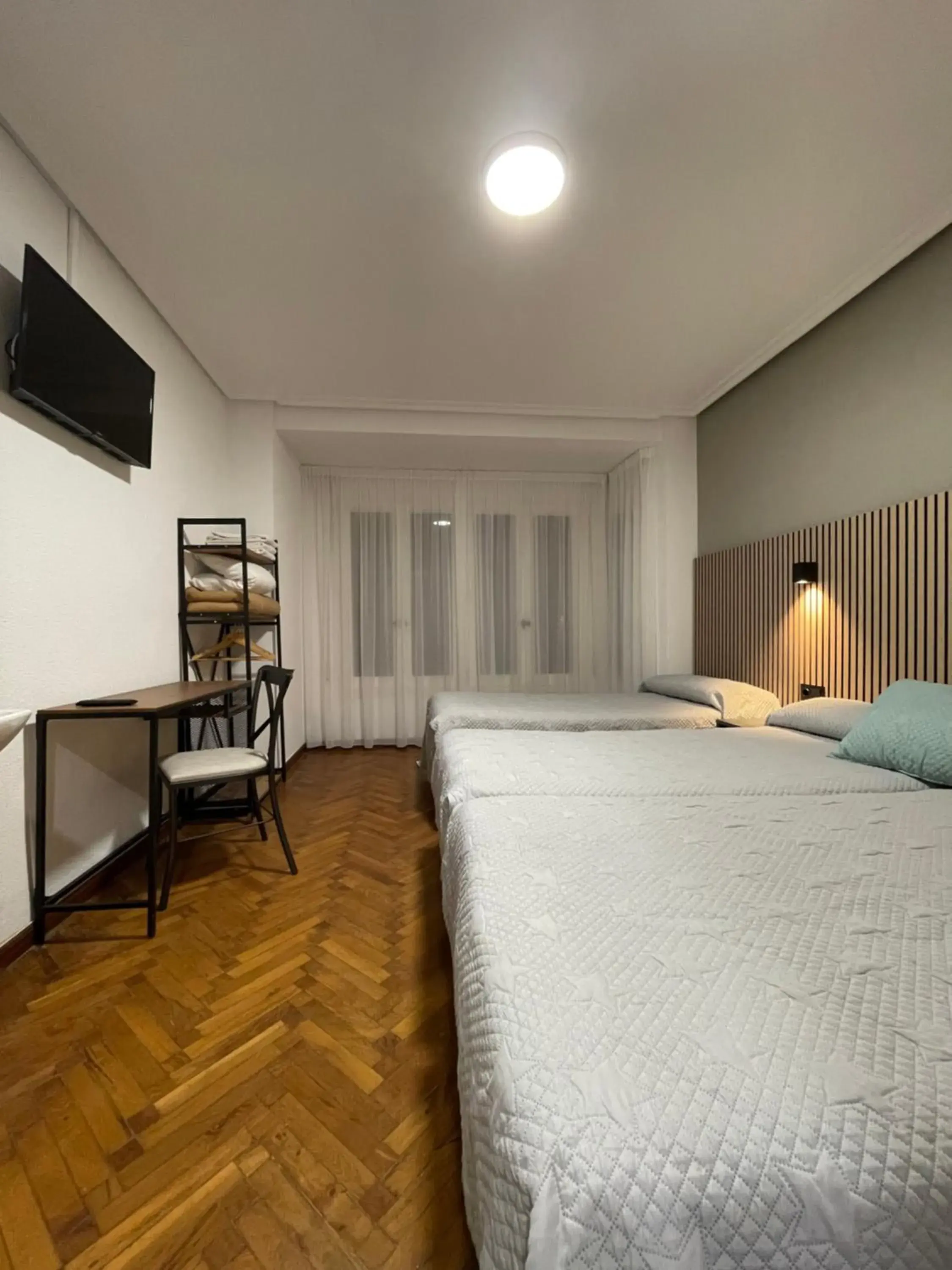 Basic Triple Room with Shared Bathroom - single occupancy in Pensión La Encina Basic Triple Room with Shared Bathroom - single occupancy in Pensión La Encina