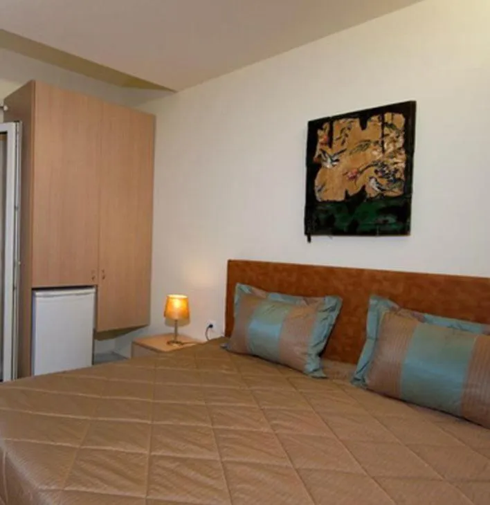 Bed in Venus Beach Hotel