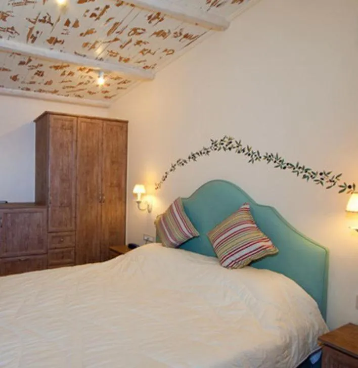 Bed in Venus Beach Hotel