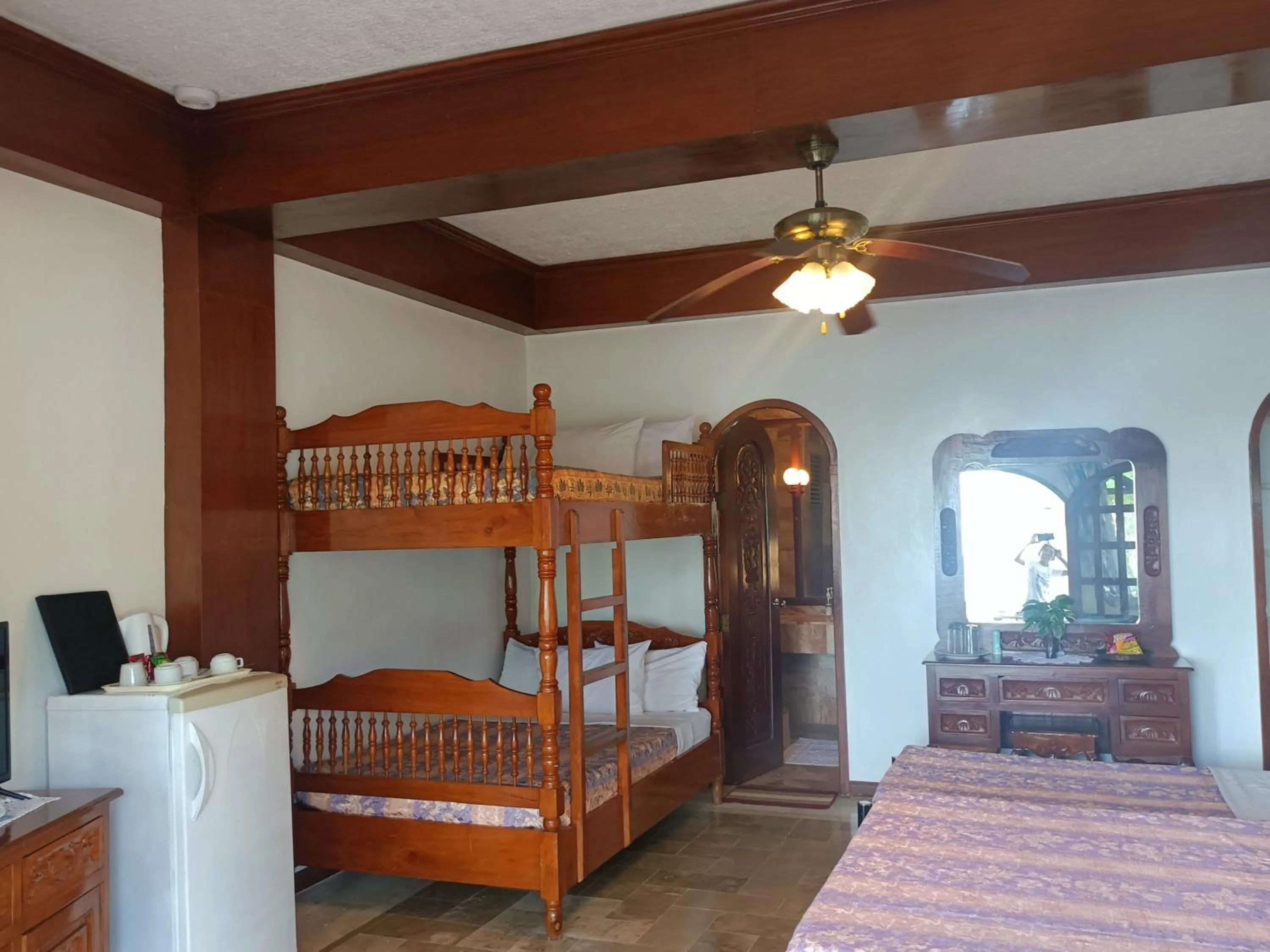 Bed in Blue Crystal Beach Resort