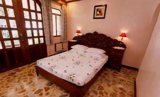 Bed in Blue Crystal Beach Resort