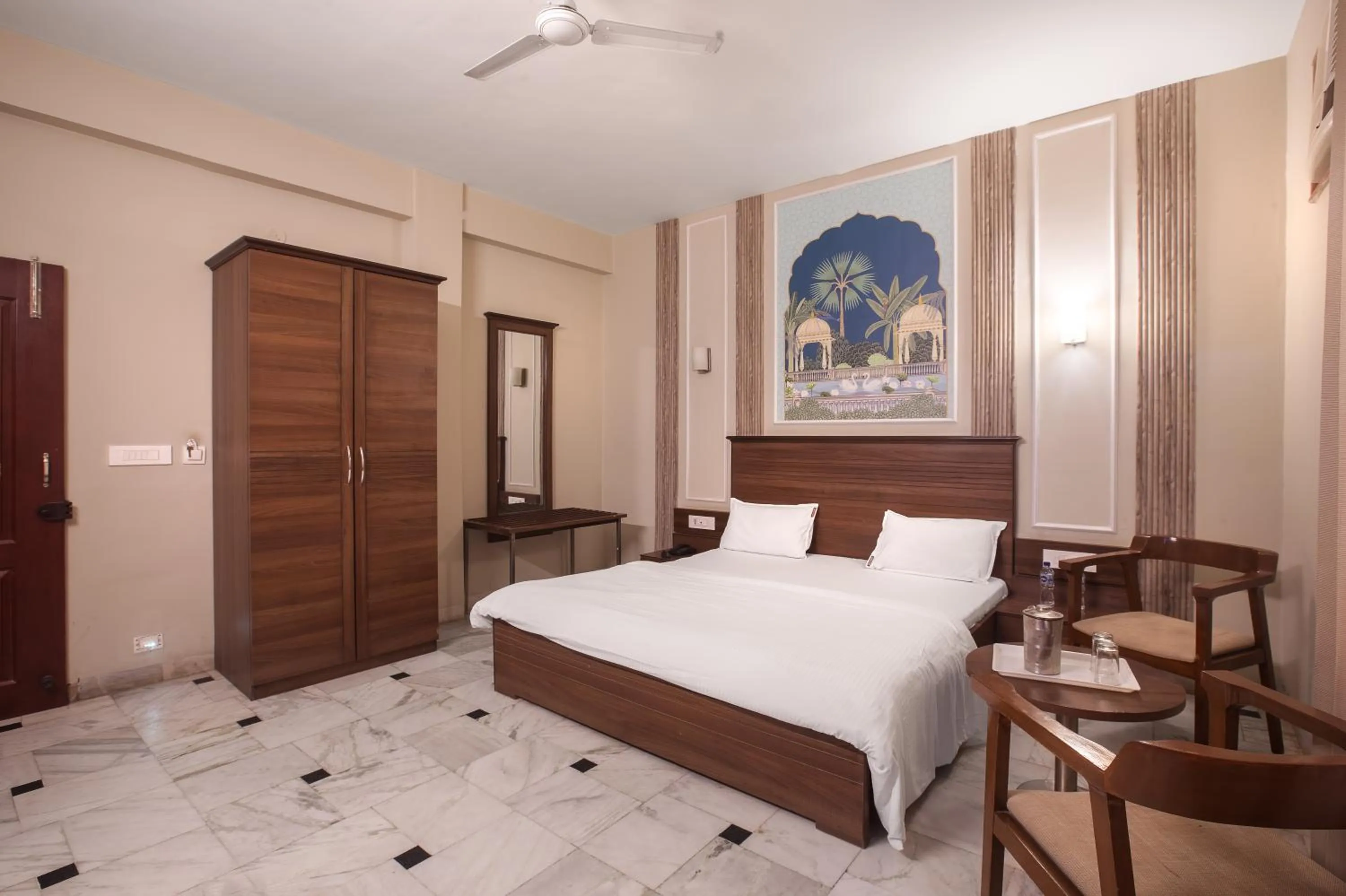 Bed in Hotel Bhakti Dhama