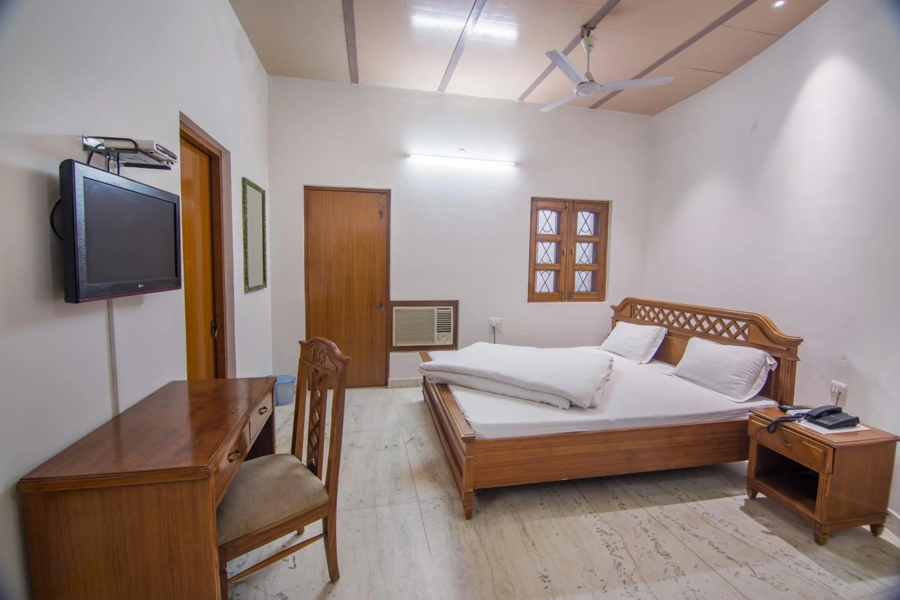 Bedroom, Bed in Hotel Bhakti Dhama