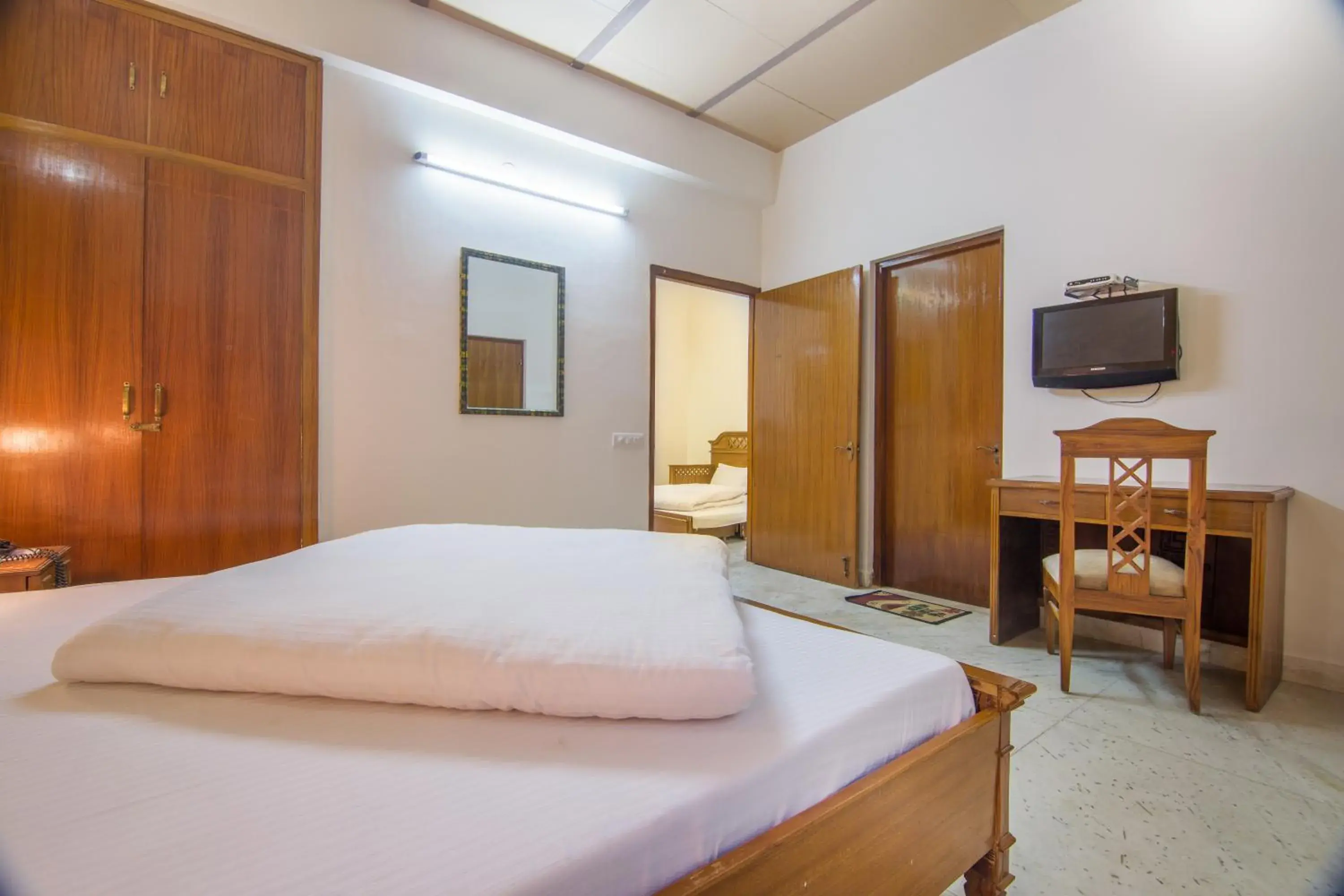 Bed in Hotel Bhakti Dhama Bed in Hotel Bhakti Dhama