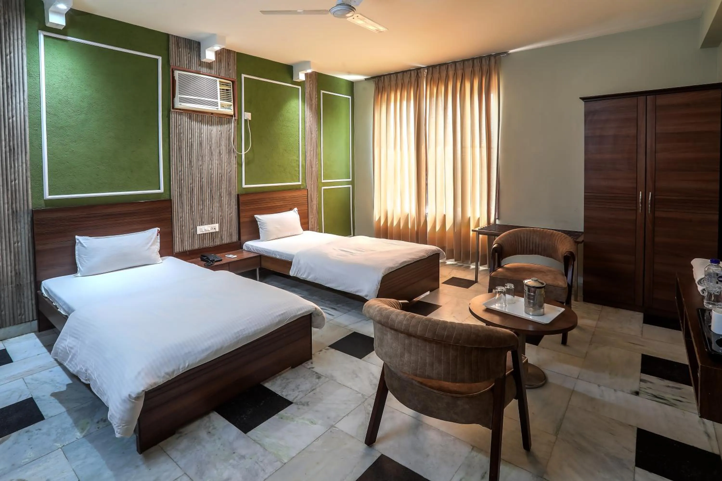 Bed in Hotel Bhakti Dhama