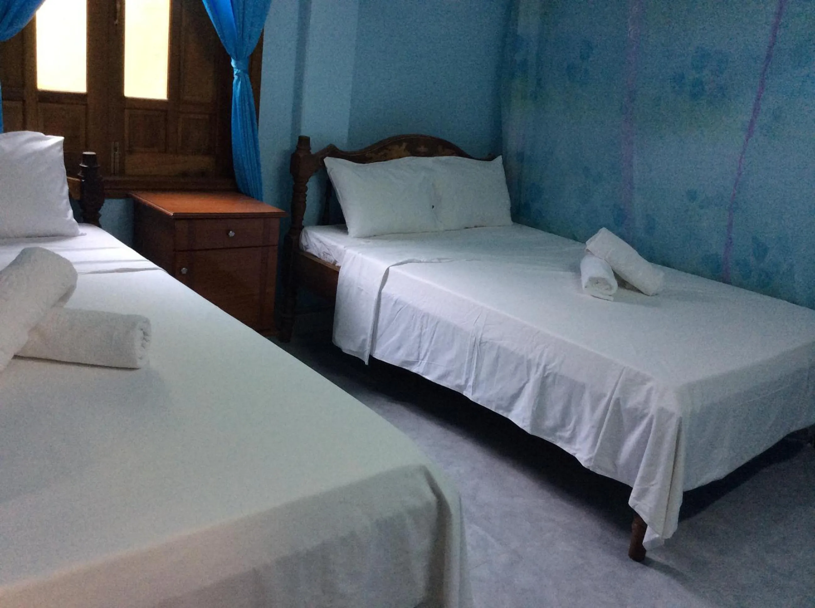 Bed in Cham Island Smiles Homestay