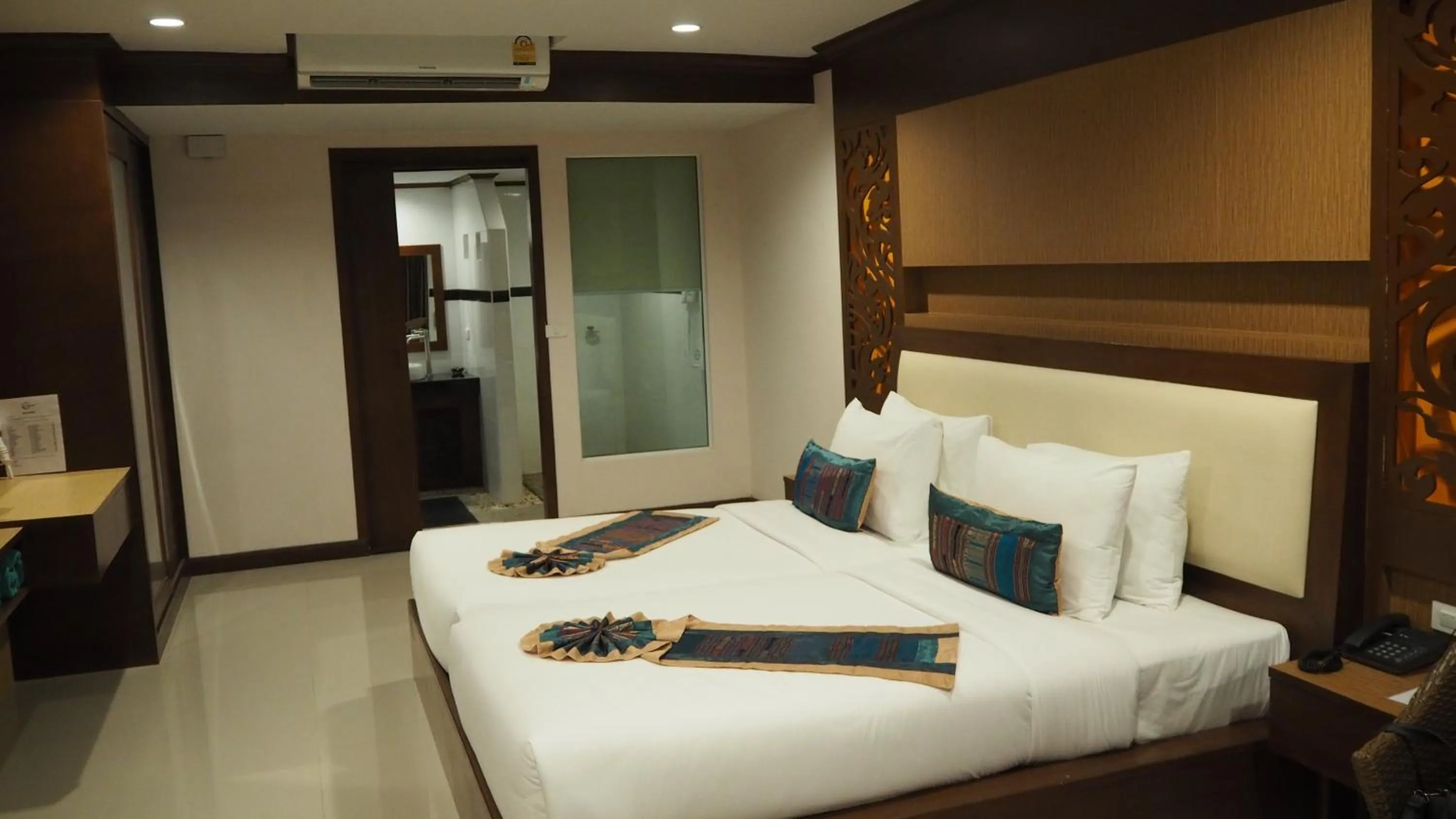 Bed in Chivatara Resort Bang Tao Beach Phuket - SHA