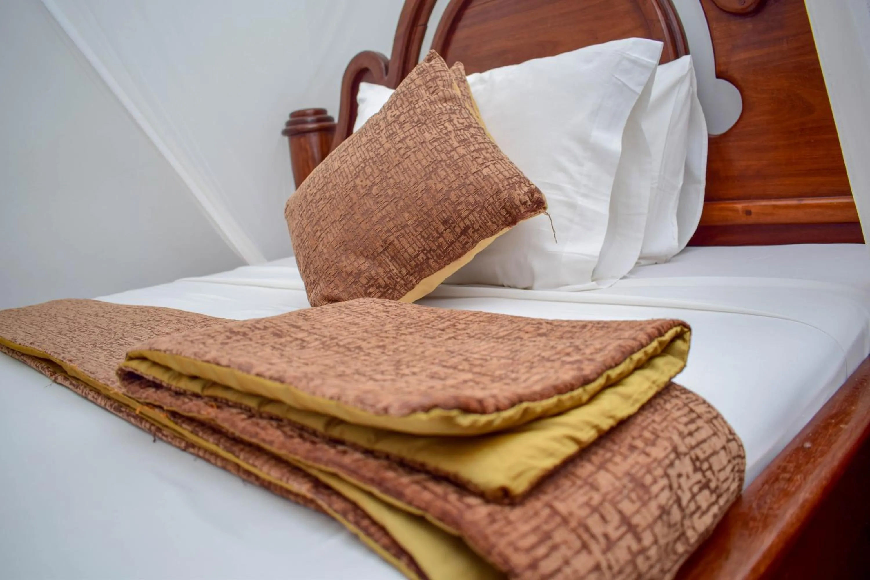 Bed in Zanzibar Ocean View Hotel