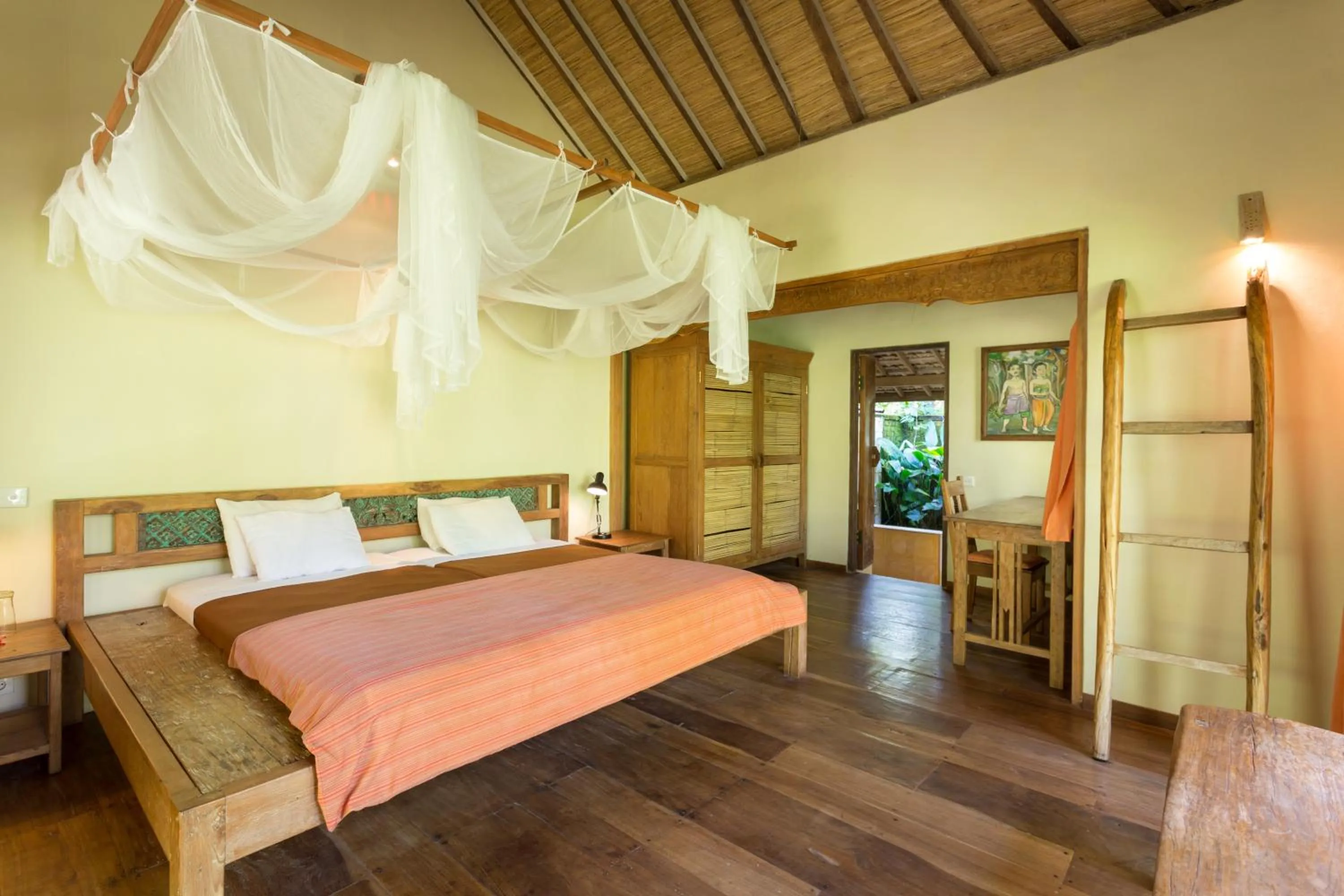 Bed in Prana Dewi Mountain Resort