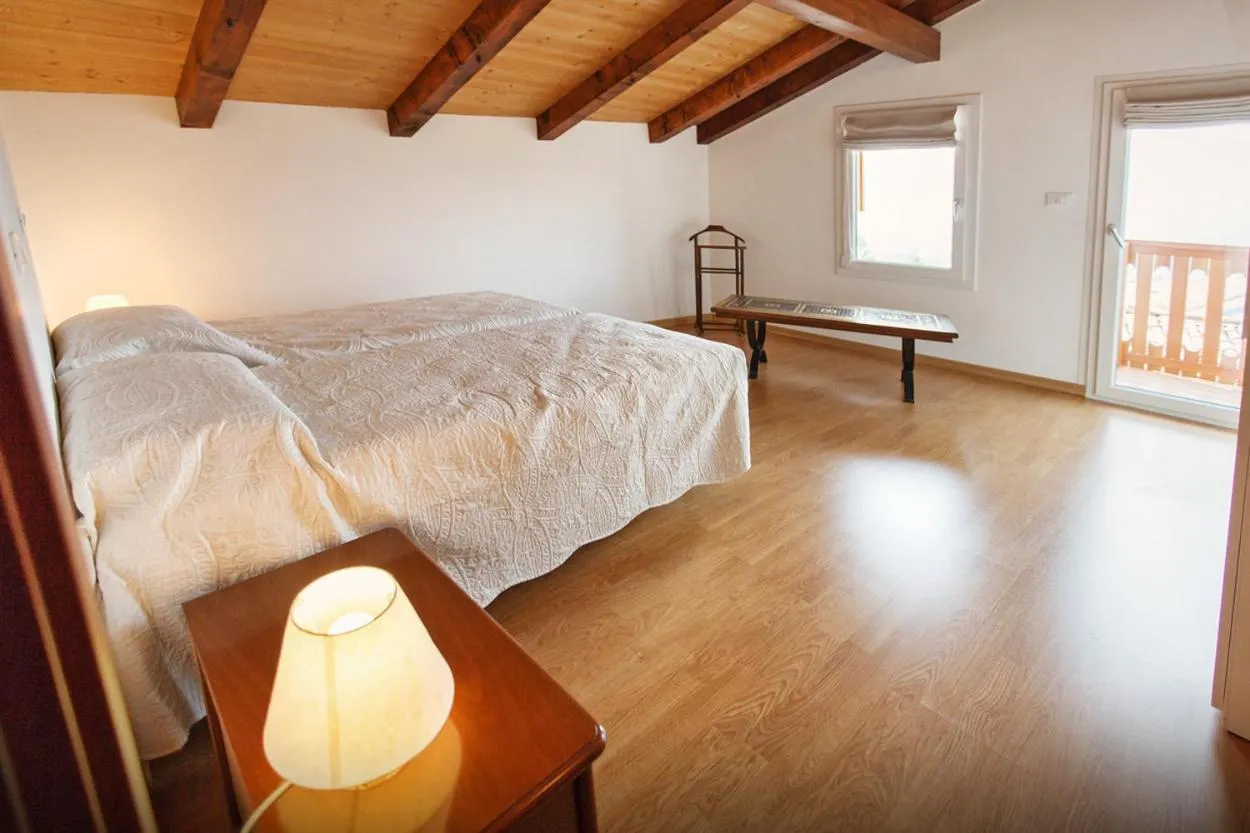 Photo of the whole room, Bed in Albergo Diffuso "Col Gentile" Socchieve