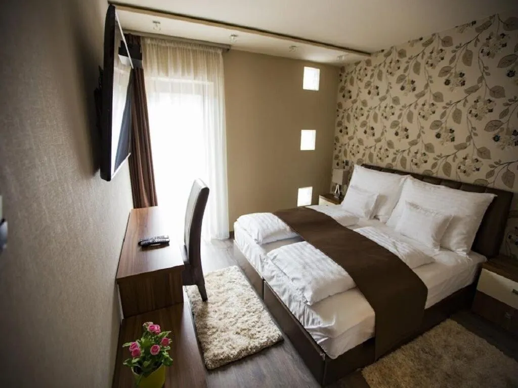 Bed in Pole Position Beach Hotel