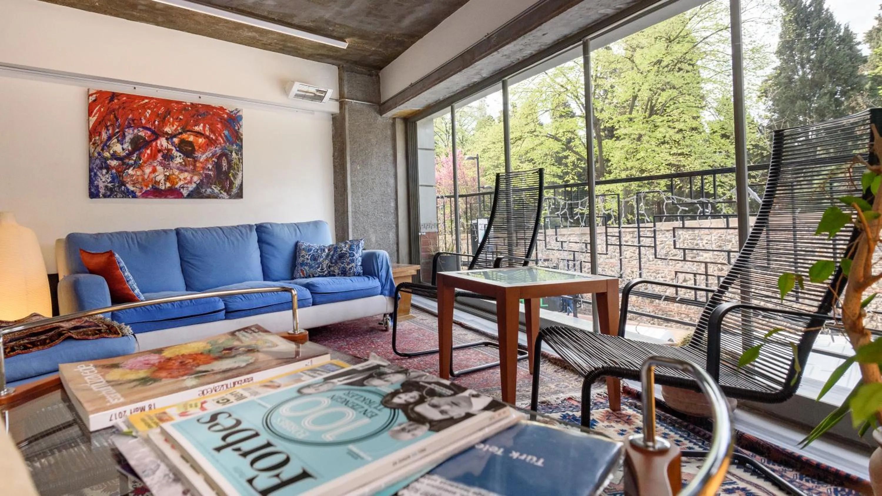 Communal lounge/ TV room in Numi Hotel