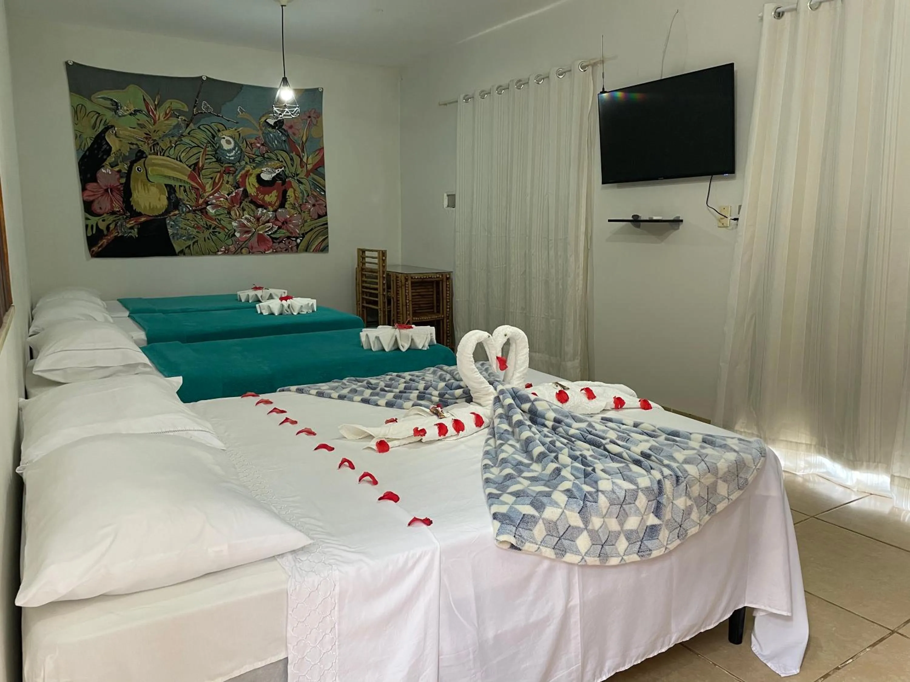 Bed in Pousada Vôo da Águia