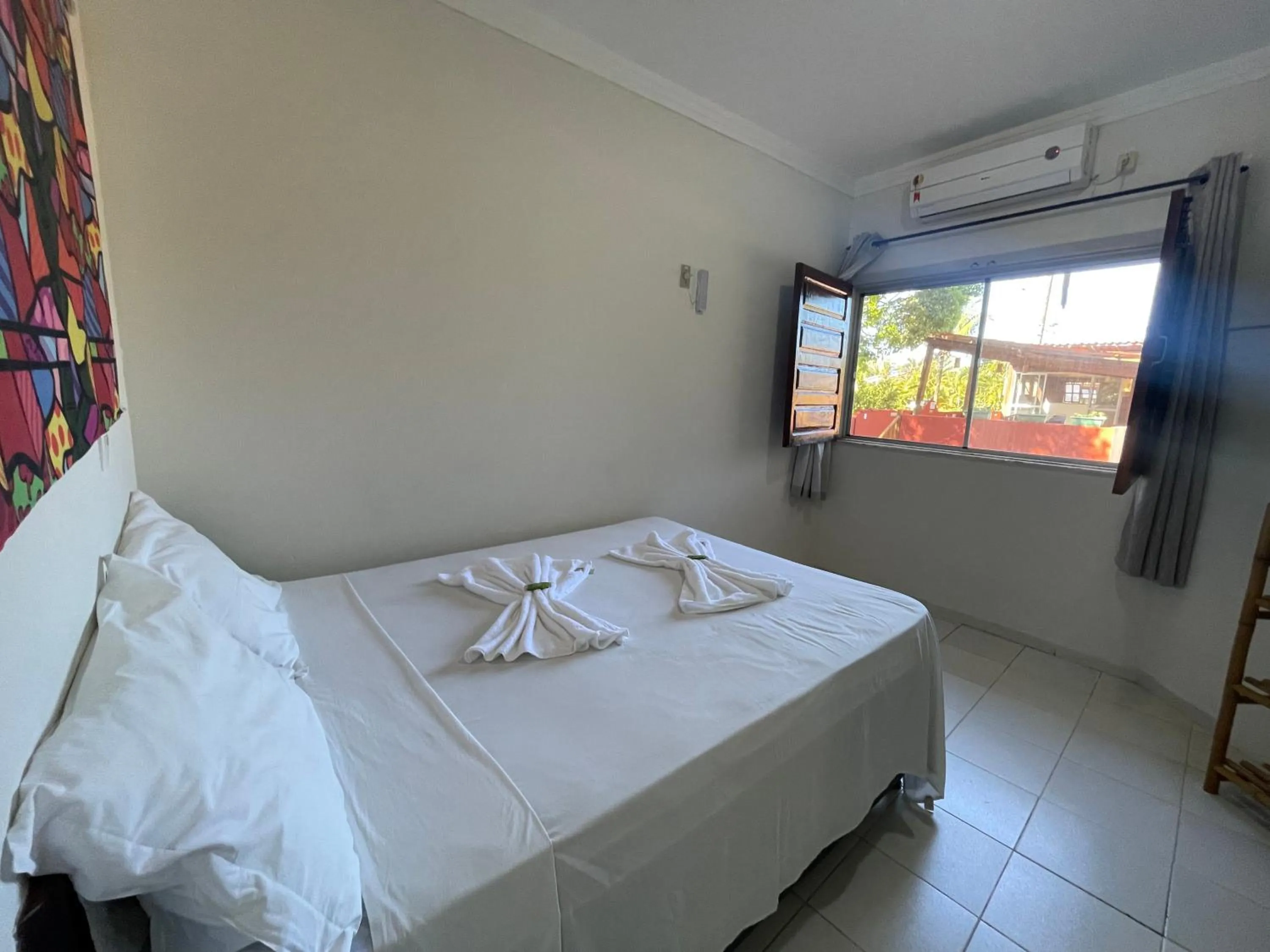 Bed in Pousada Vôo da Águia