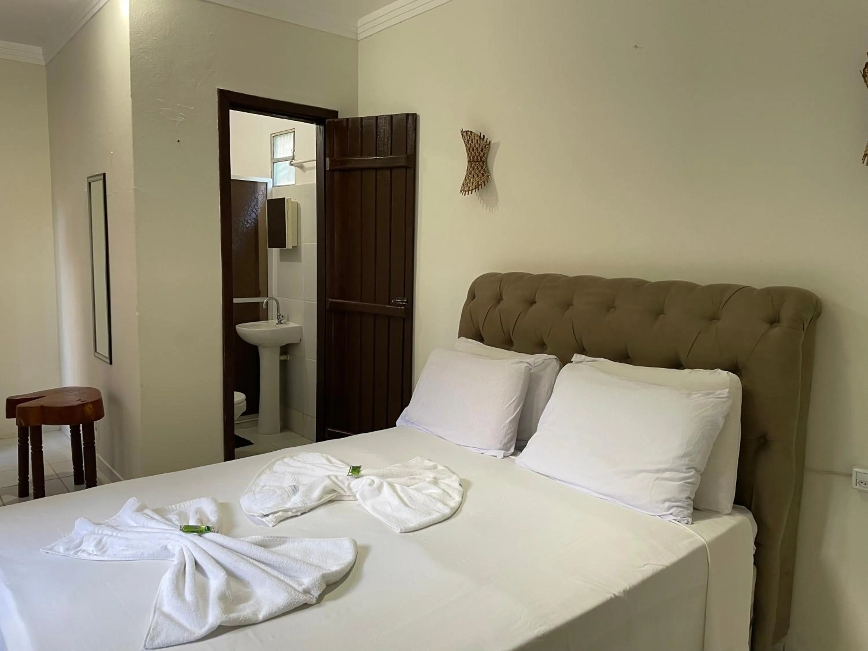 Bed in Pousada Vôo da Águia