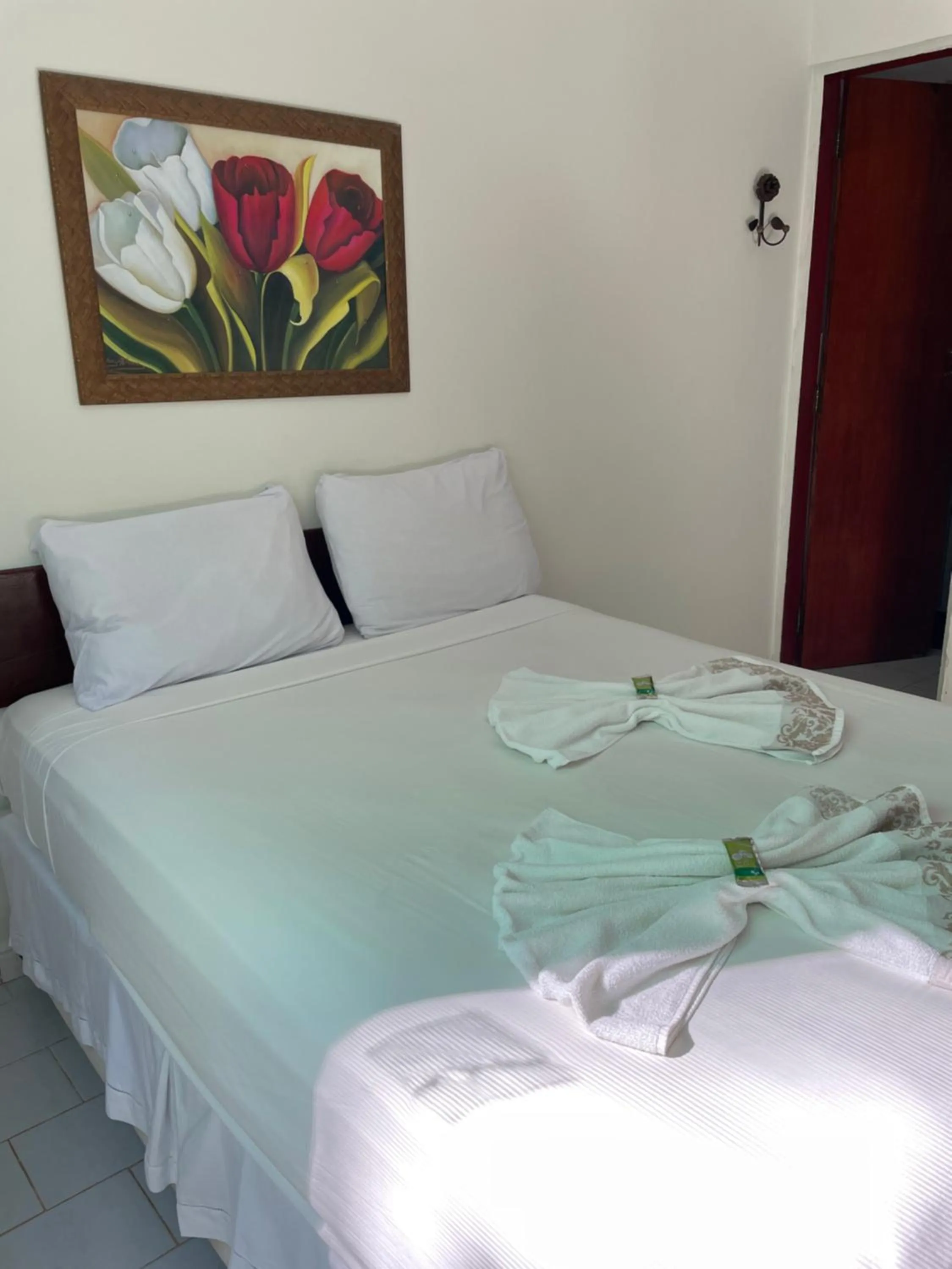 Bed in Pousada Vôo da Águia