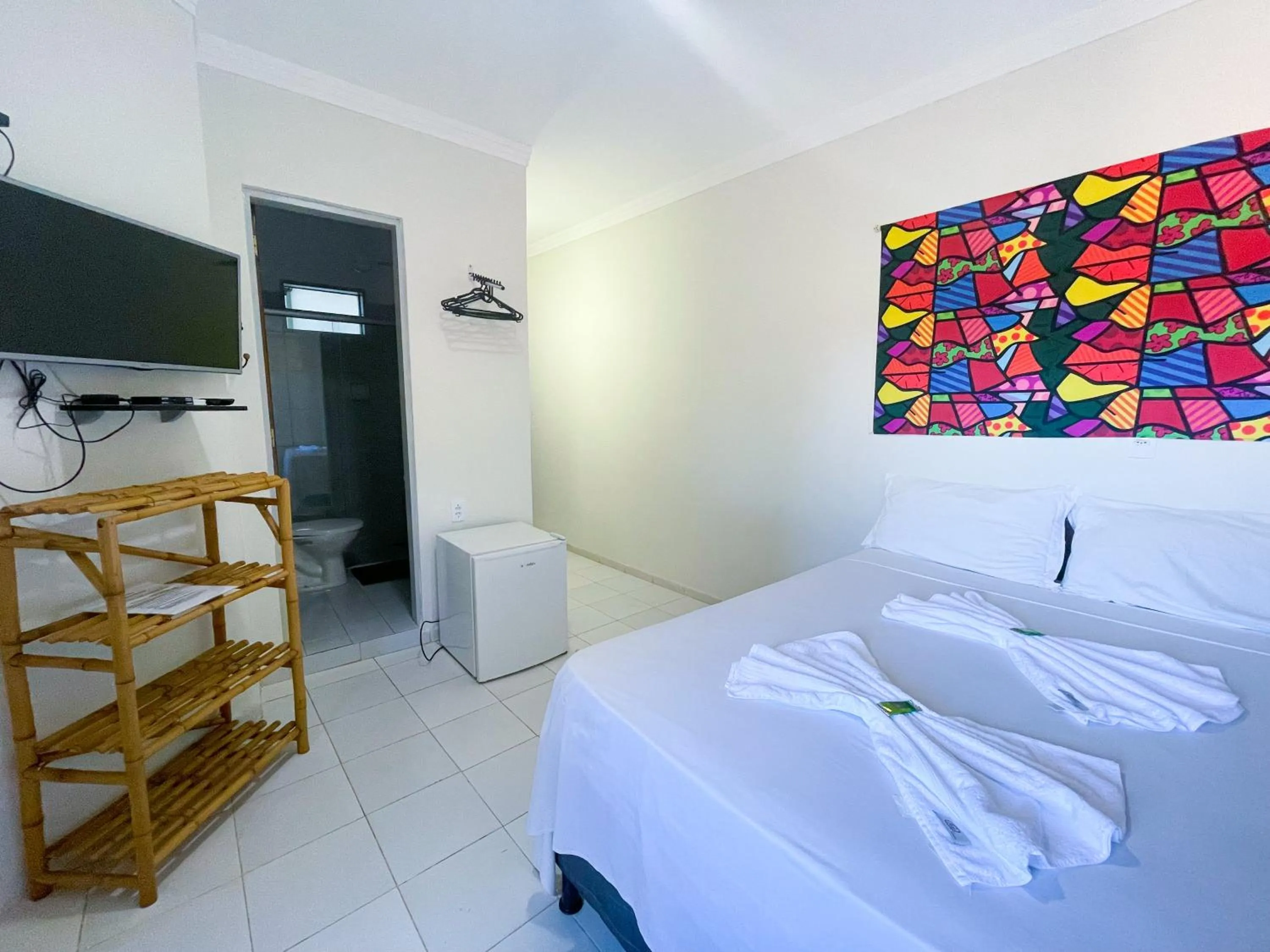 Bed in Pousada Vôo da Águia