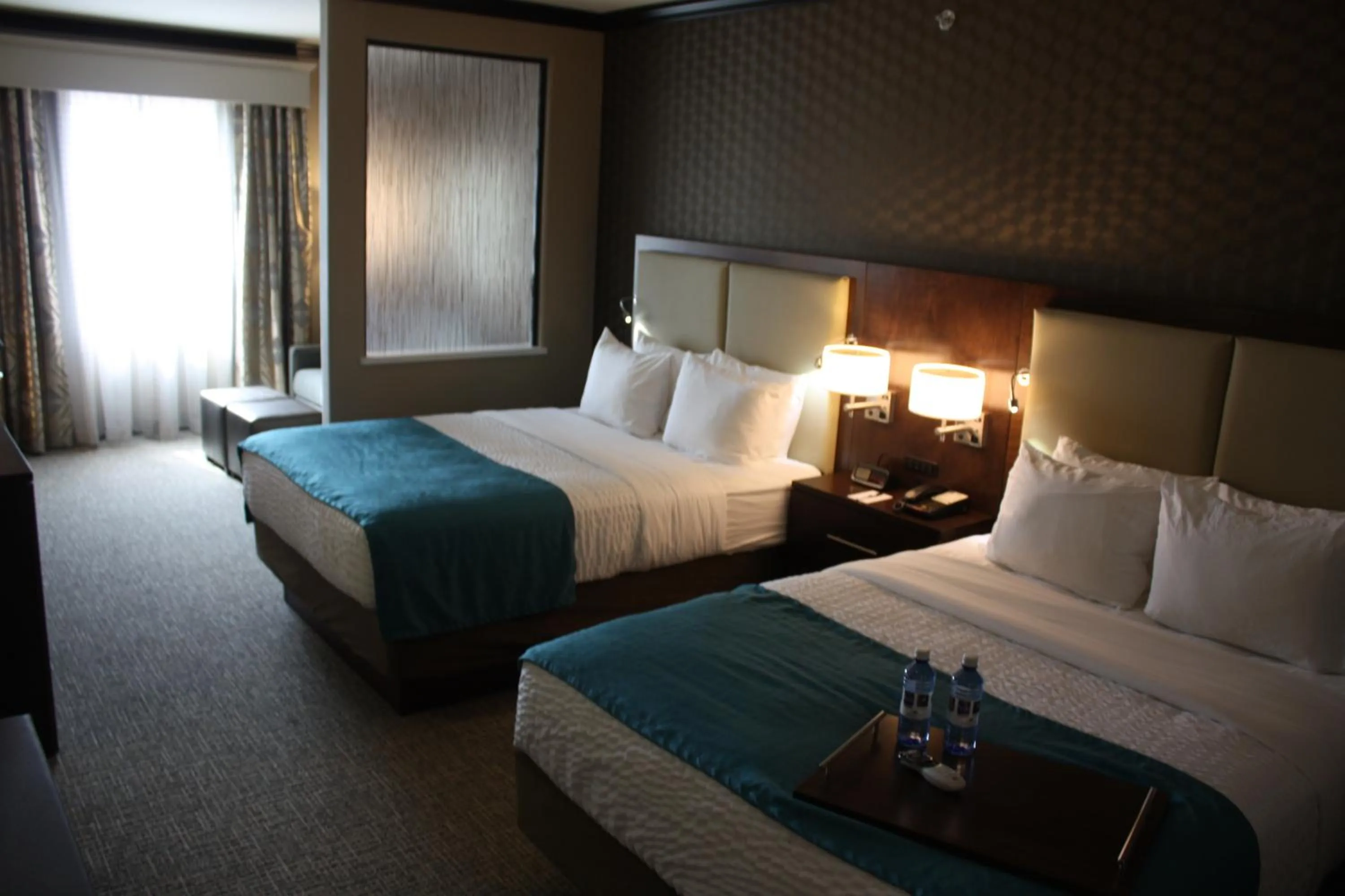 Bedroom, Room Photo in The Heritage Inn & Suites, Ascend Hotel Collection