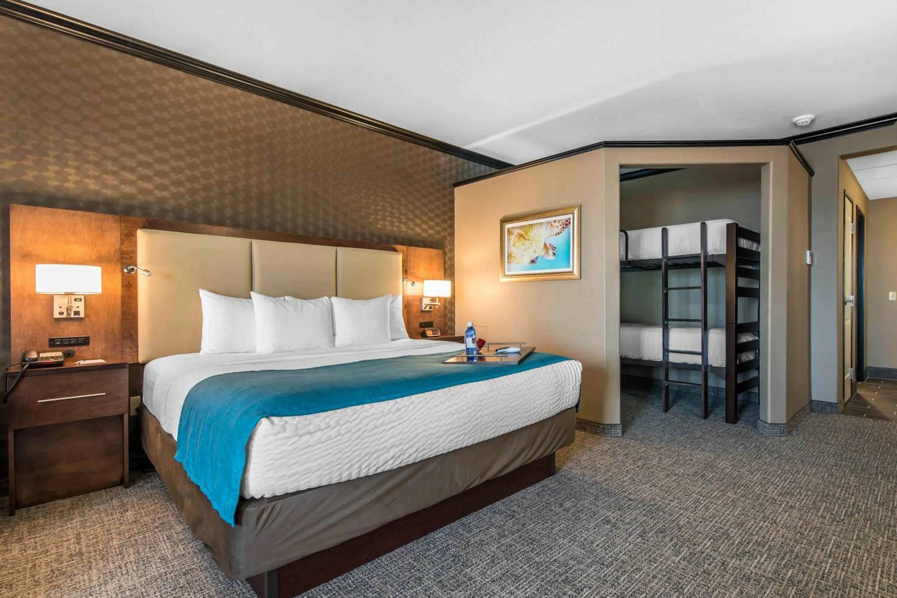 Bedroom, Room Photo in The Heritage Inn & Suites, Ascend Hotel Collection