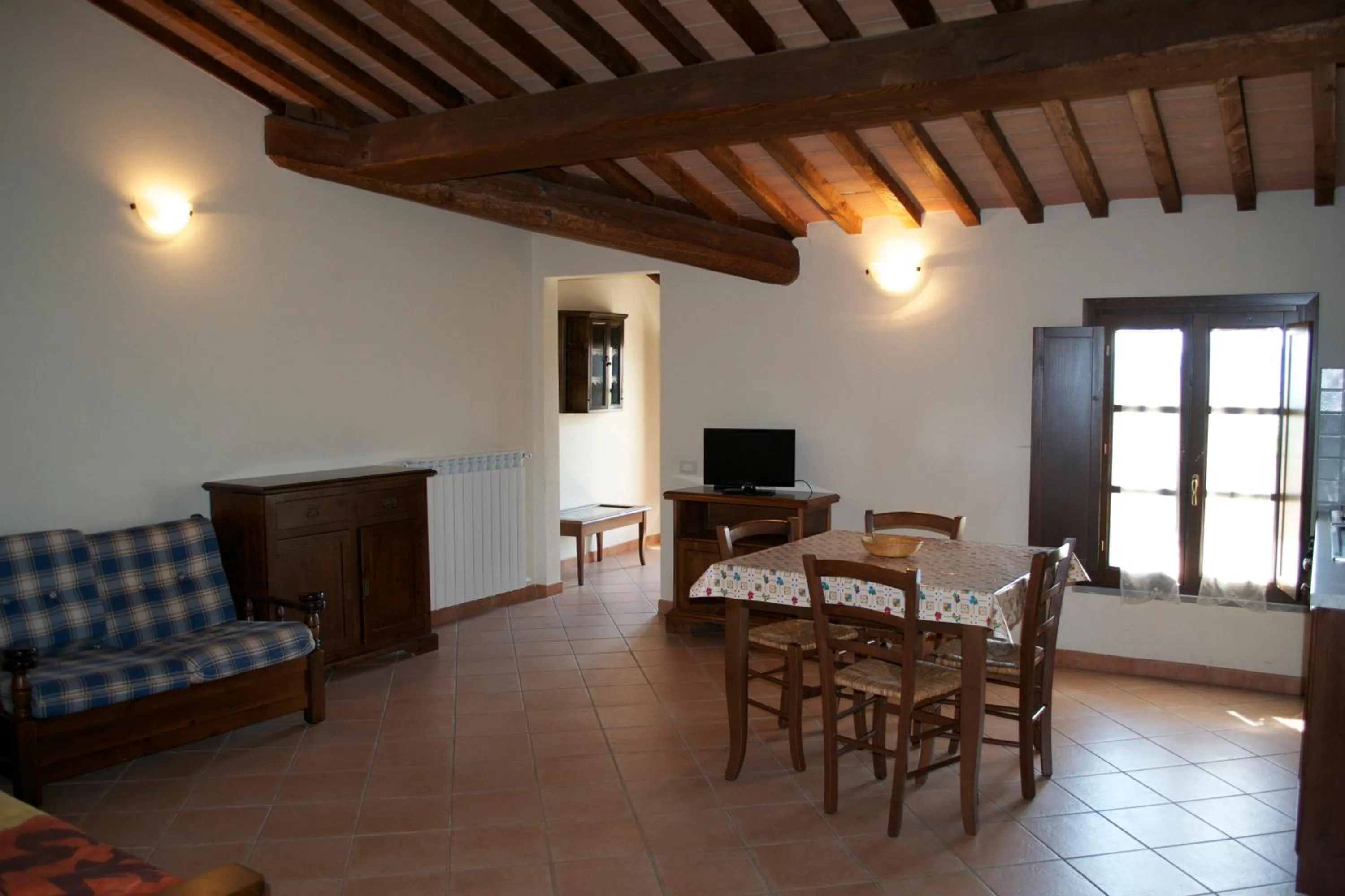 Communal lounge/ TV room in Residence Giuly Rosselmini