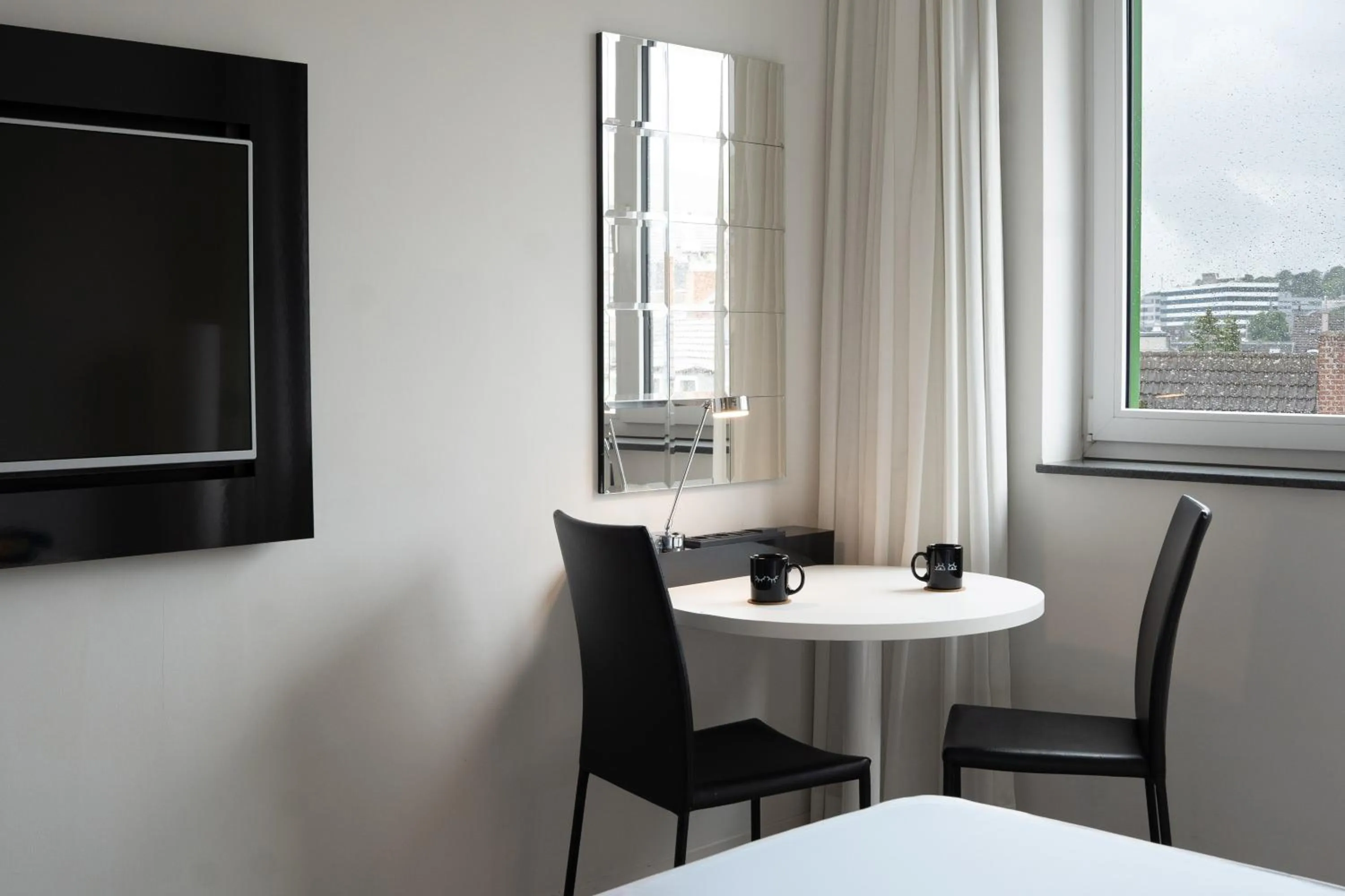 Living room in INNSiDE by Meliá Aachen