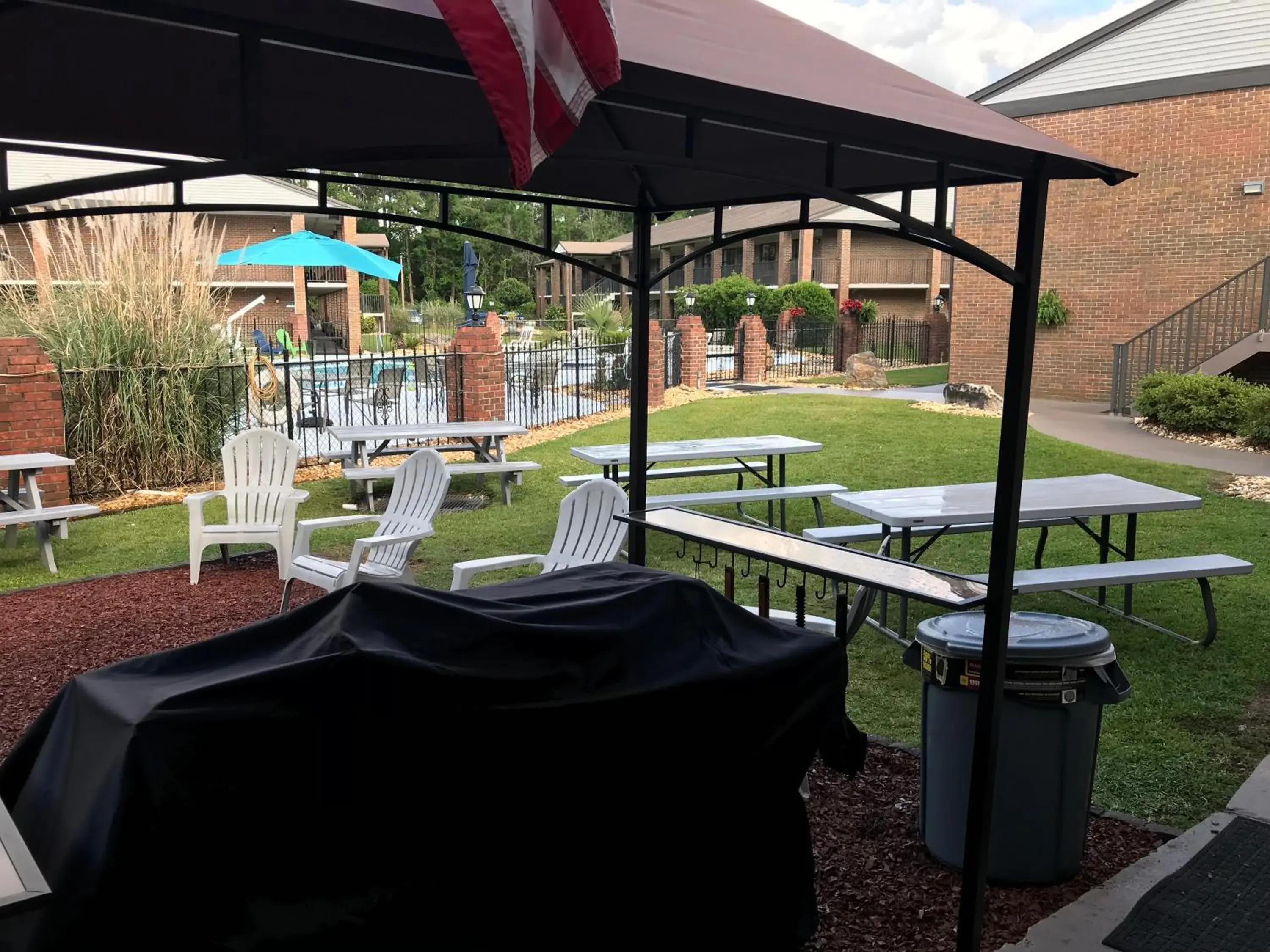 Swimming pool in At Home Inn - Pensacola Swimming pool in At Home Inn - Pensacola