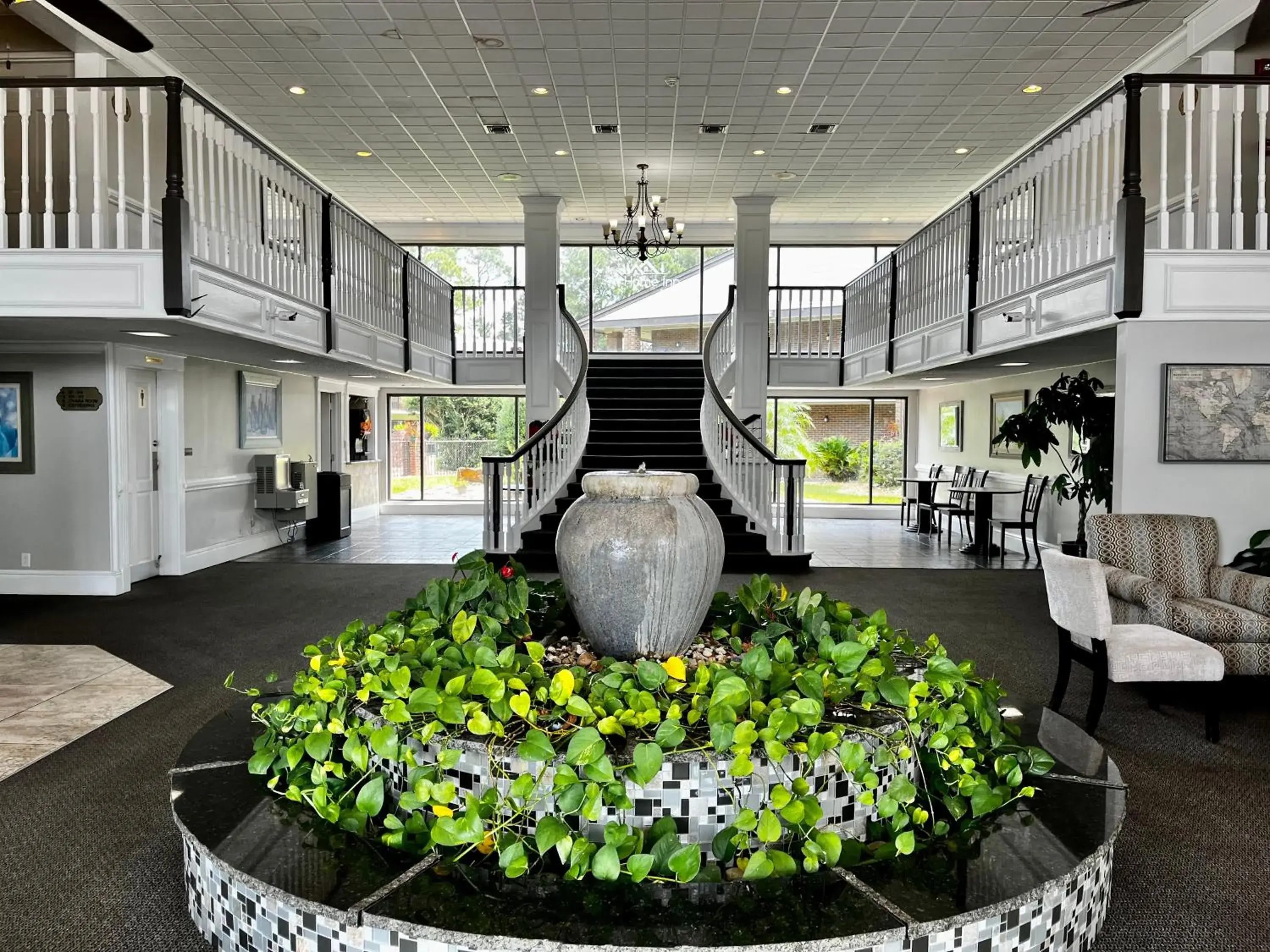 Lobby or reception in At Home Inn - Pensacola Lobby or reception in At Home Inn - Pensacola