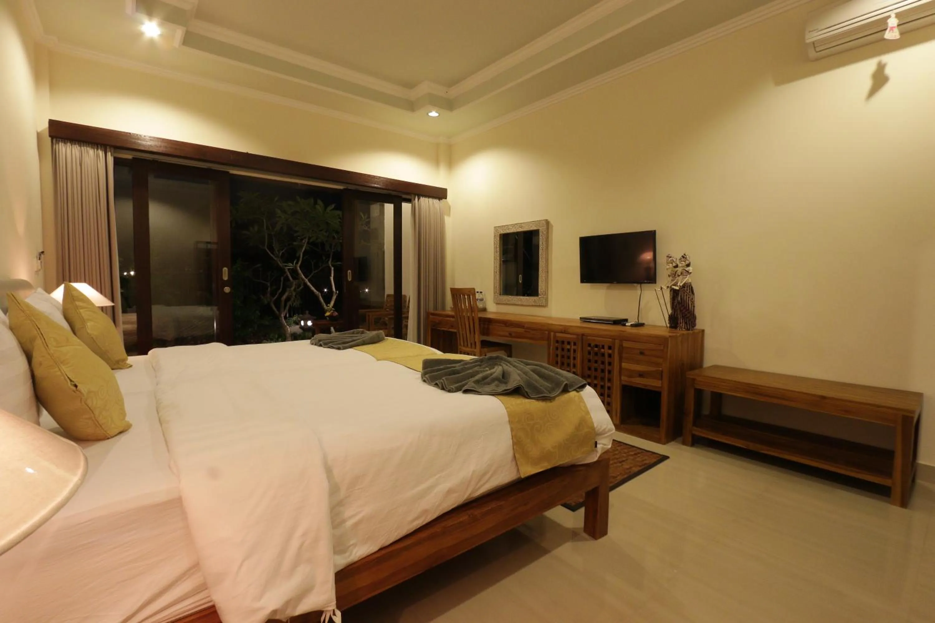Photo of the whole room, Bed in Duana Sari by Mahaputra