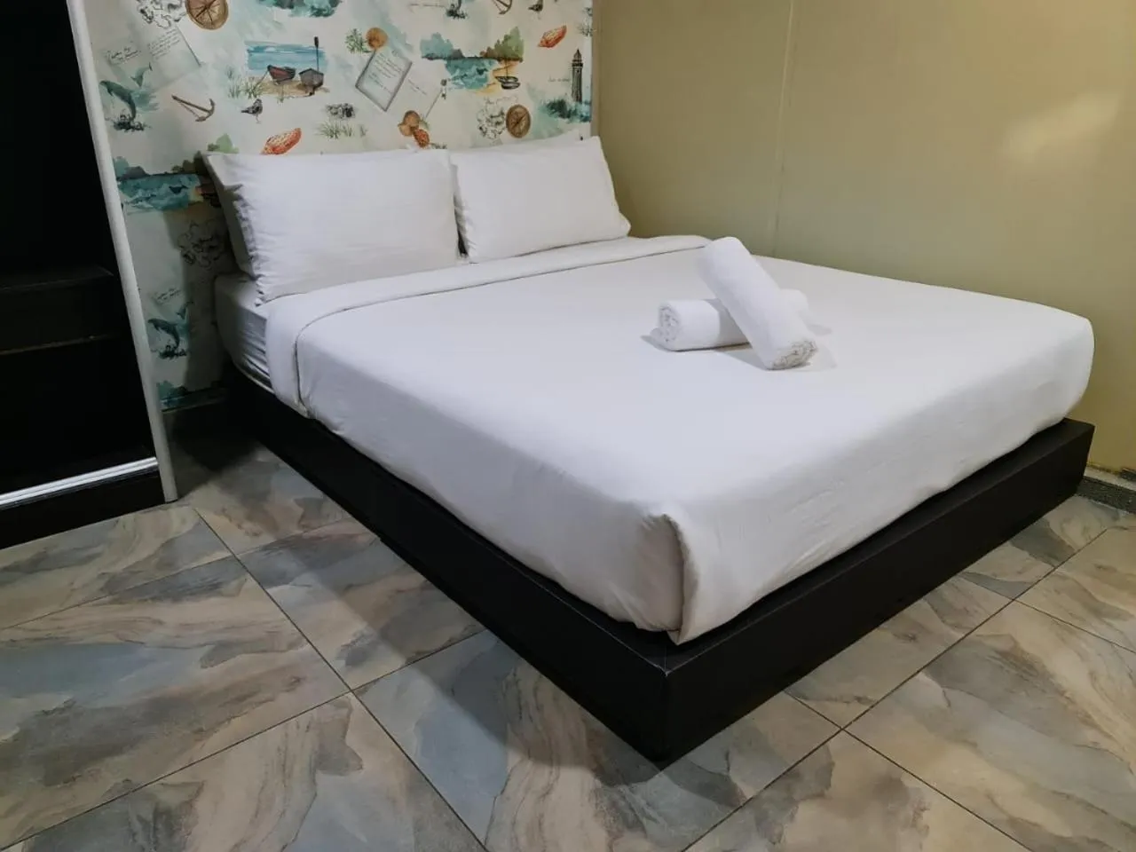 Bed in 888 Boutique Hotel