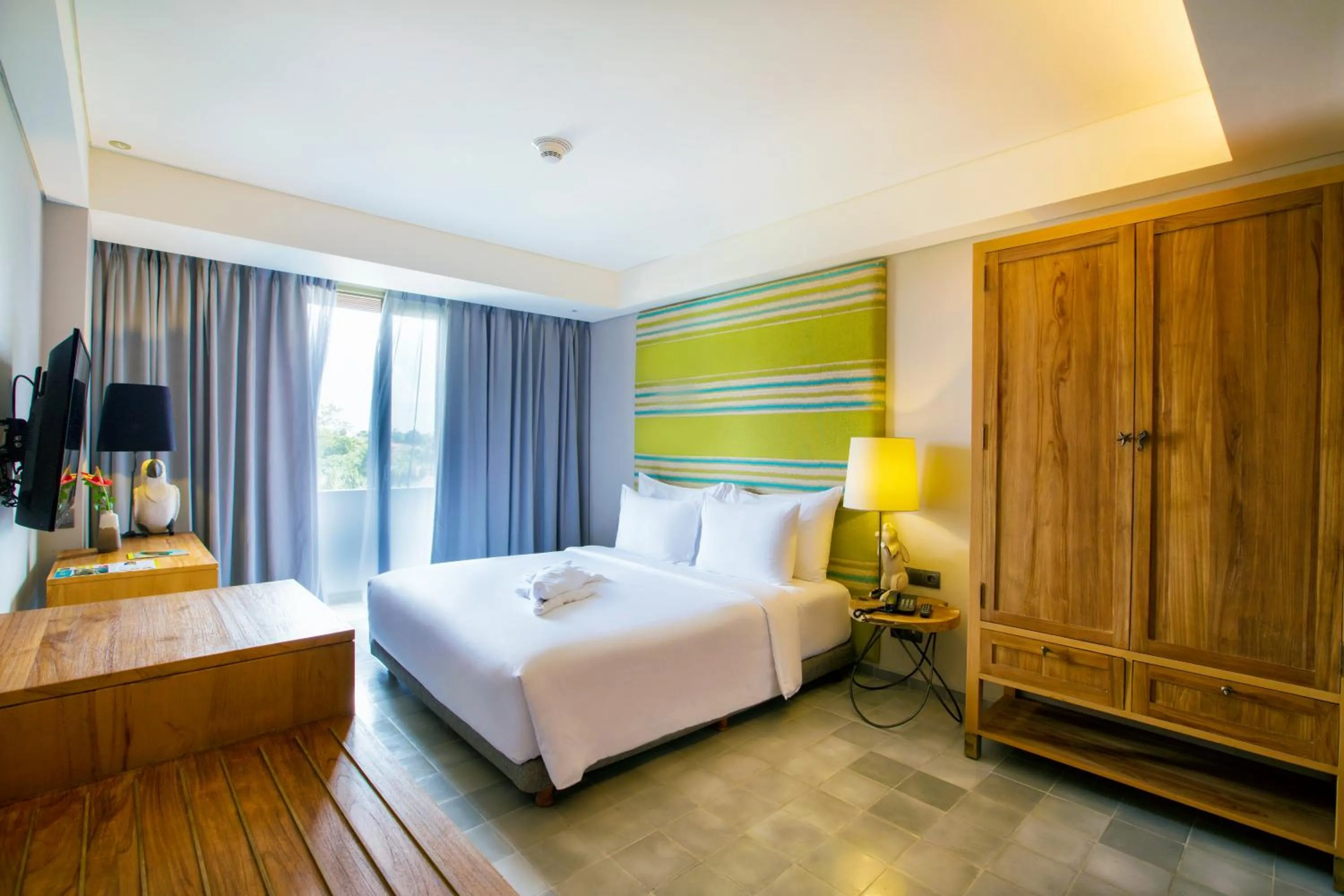 Bed in Tijili Hotel Seminyak