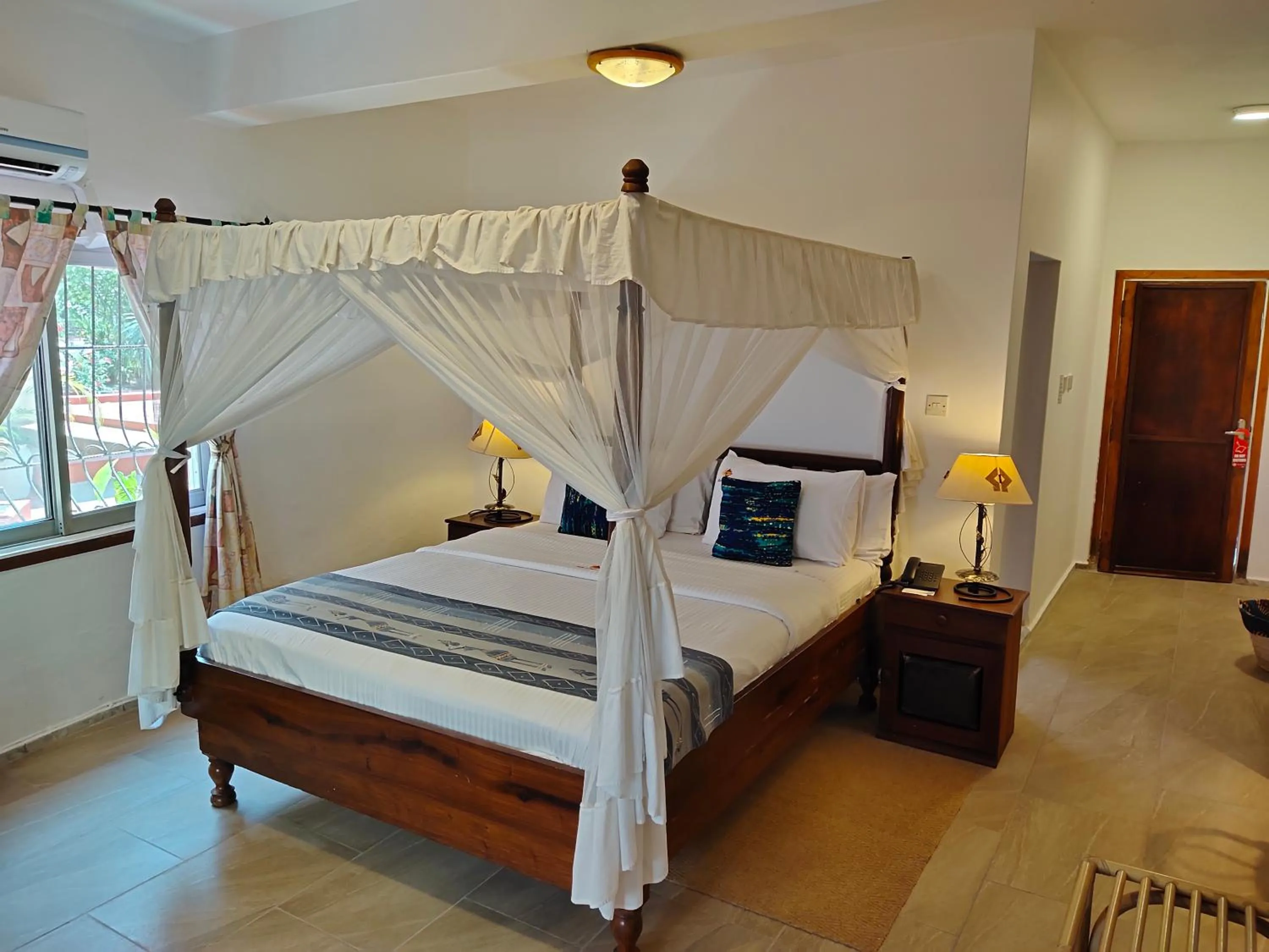 Bed in Hotel Tilapia