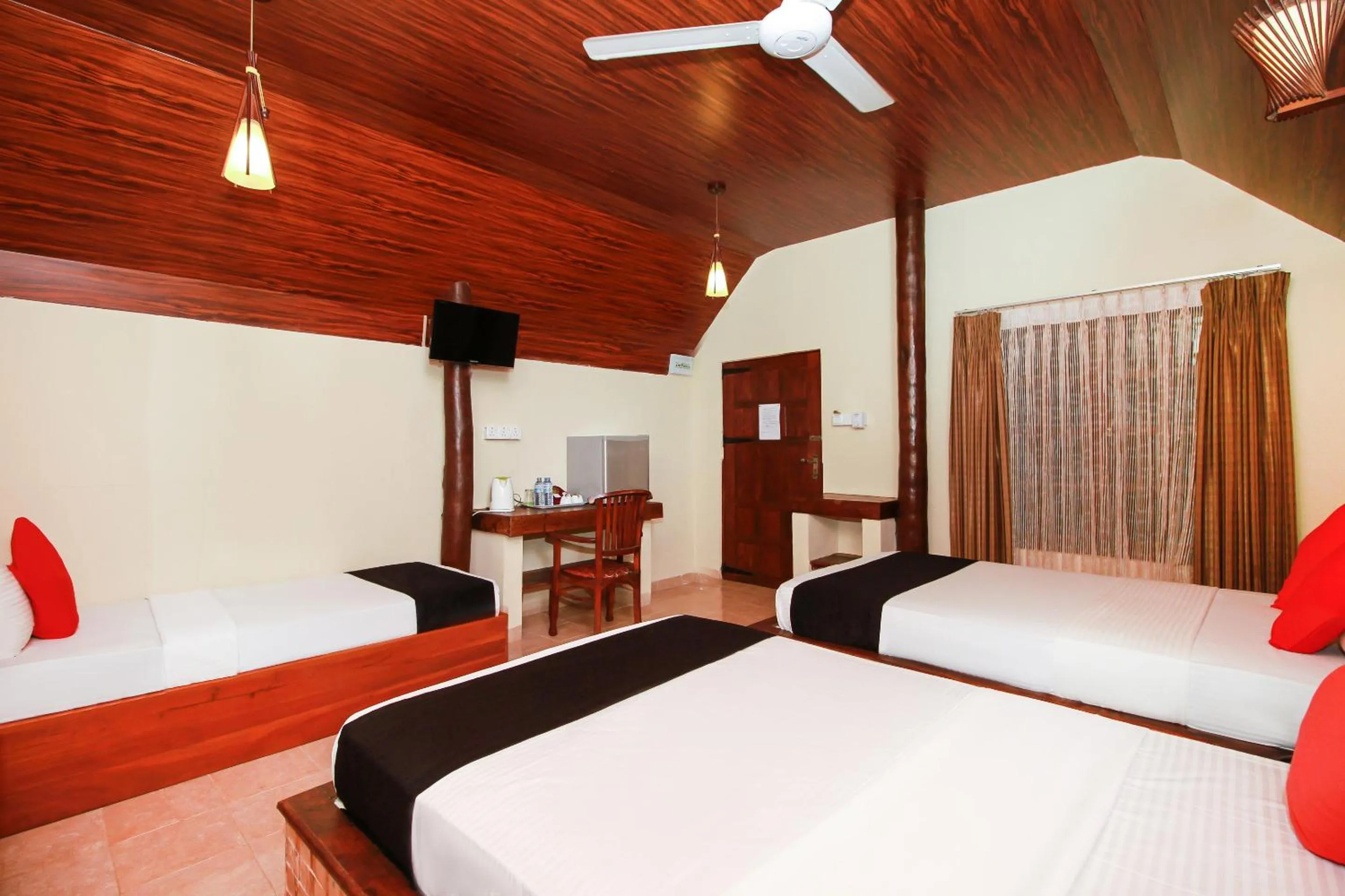 Bed in JKAB Beach Resort