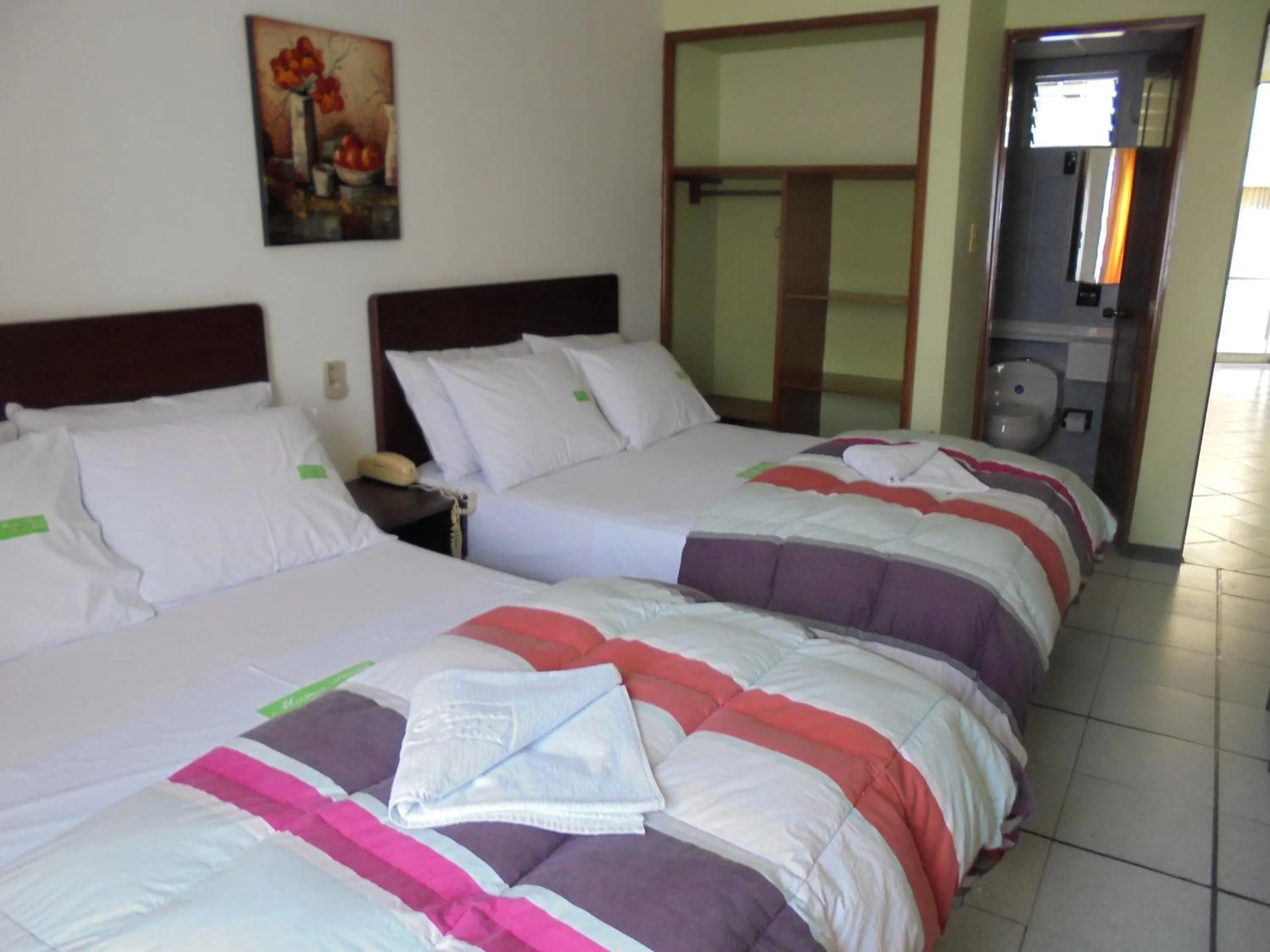 Photo of the whole room, Bed in Hotel Marux Plaza