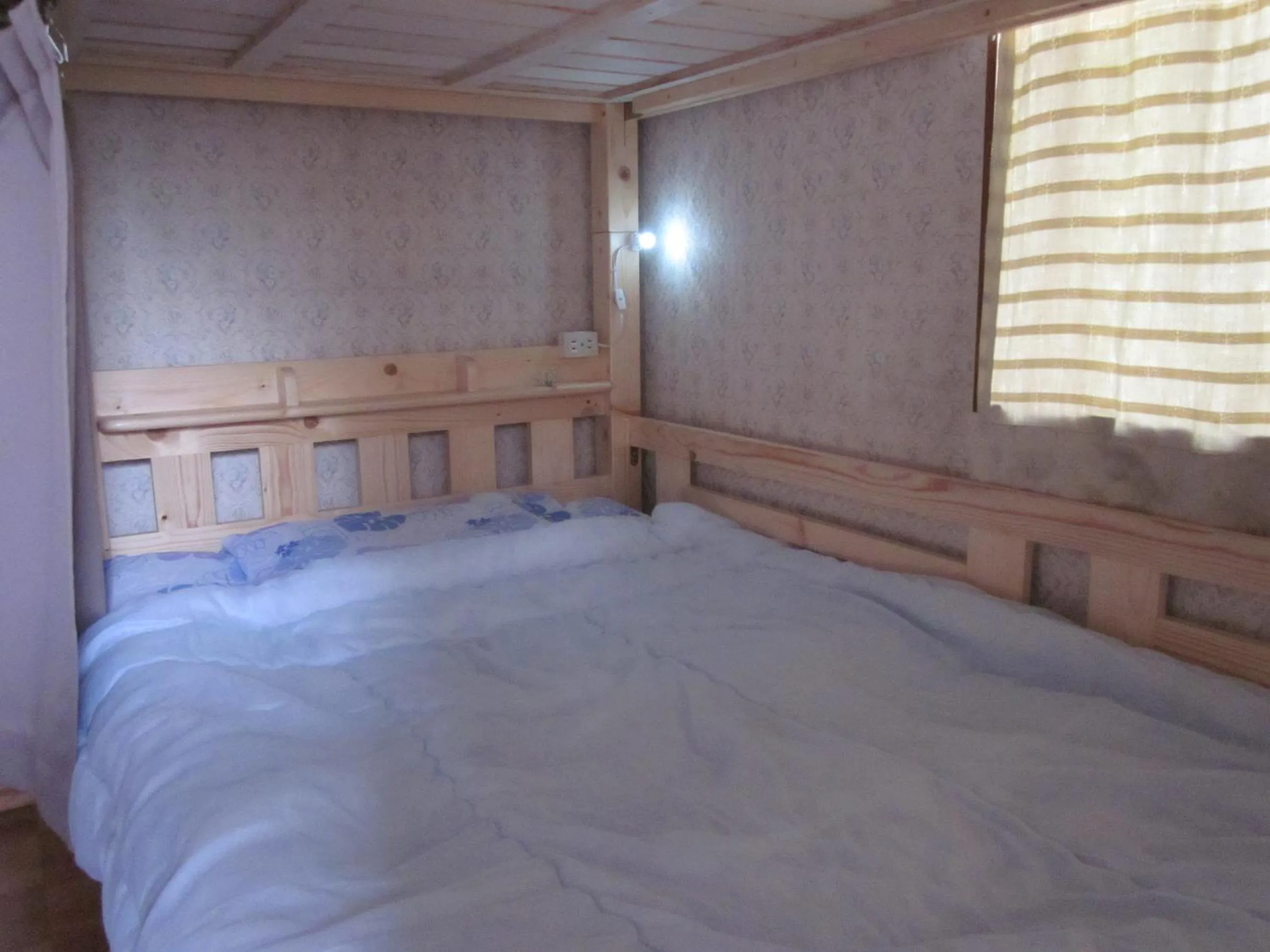 Bed in Enman Guest House Osaka