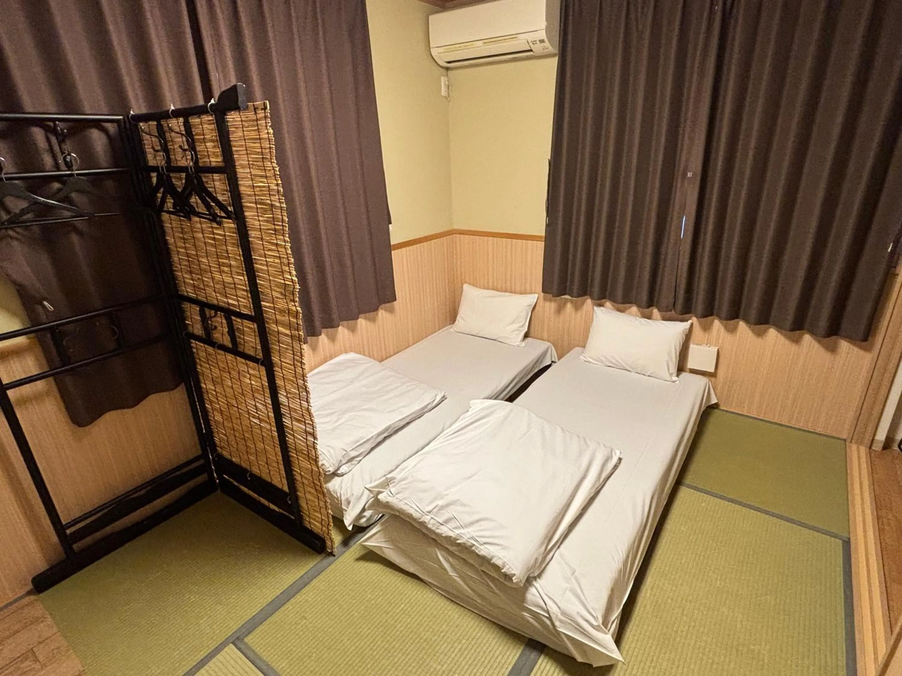 Bed in GuestHouse Guu