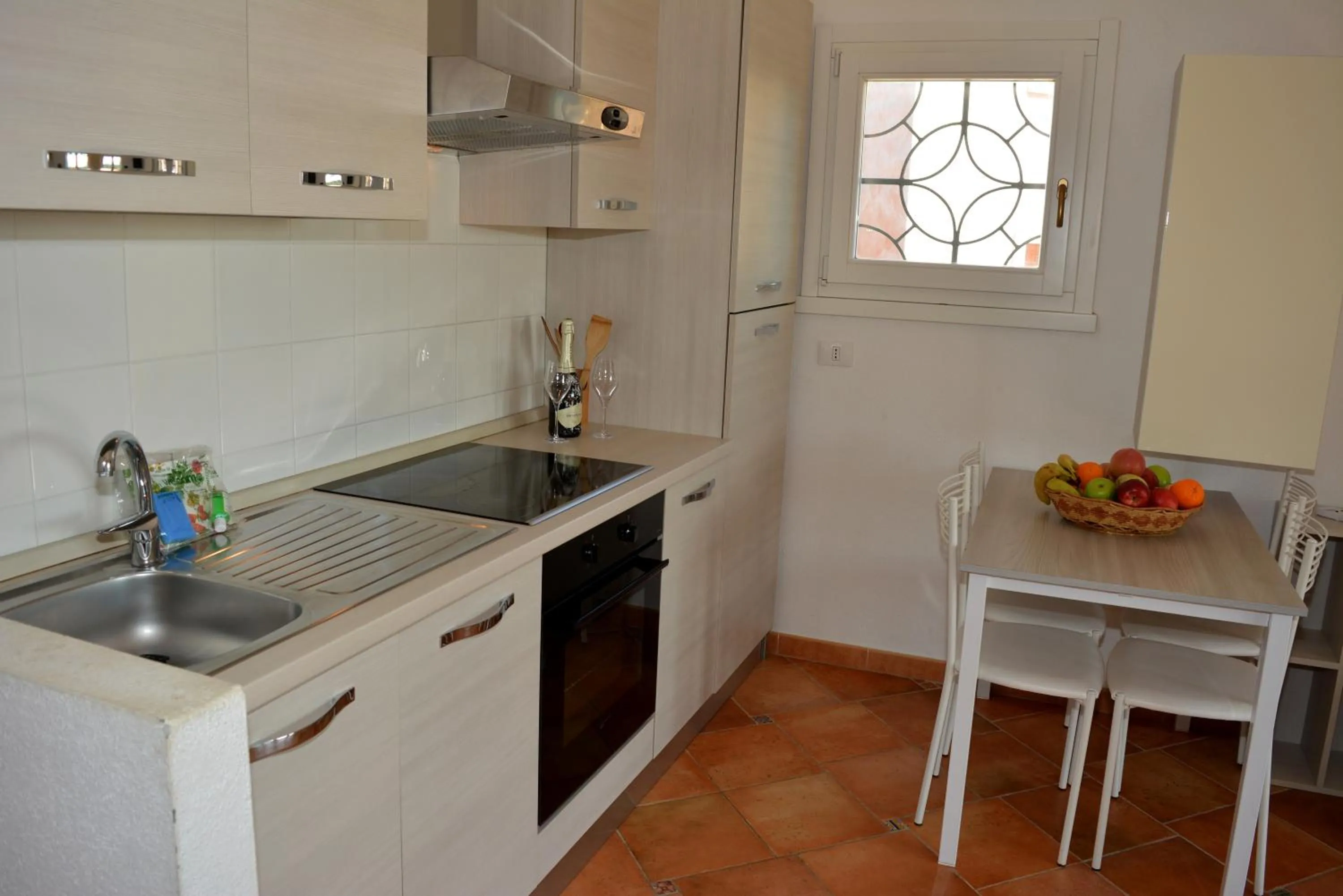 Kitchen or kitchenette in Appartamenti Residence Zodiaco