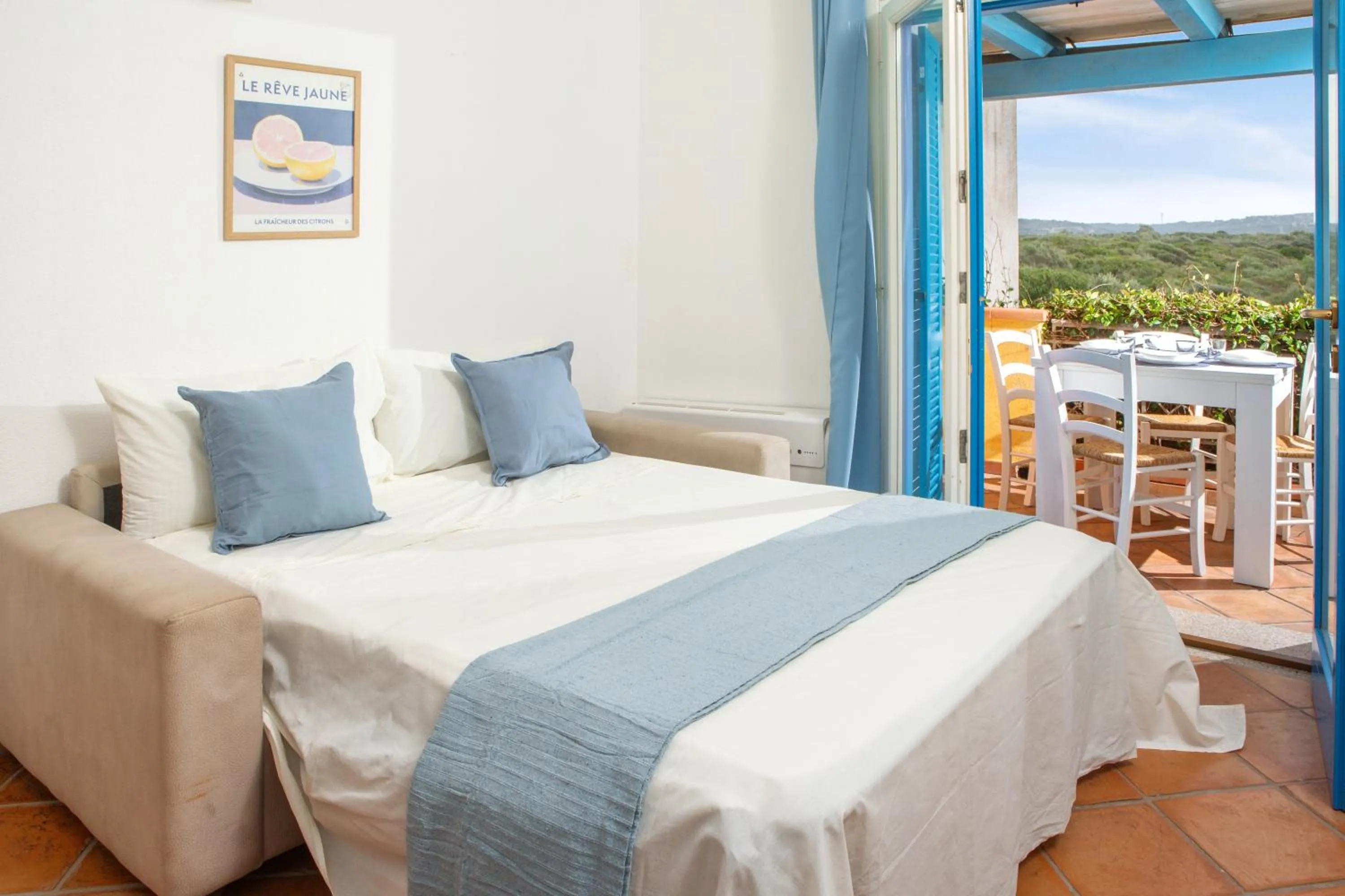 Living room, Bed in Appartamenti Residence Zodiaco