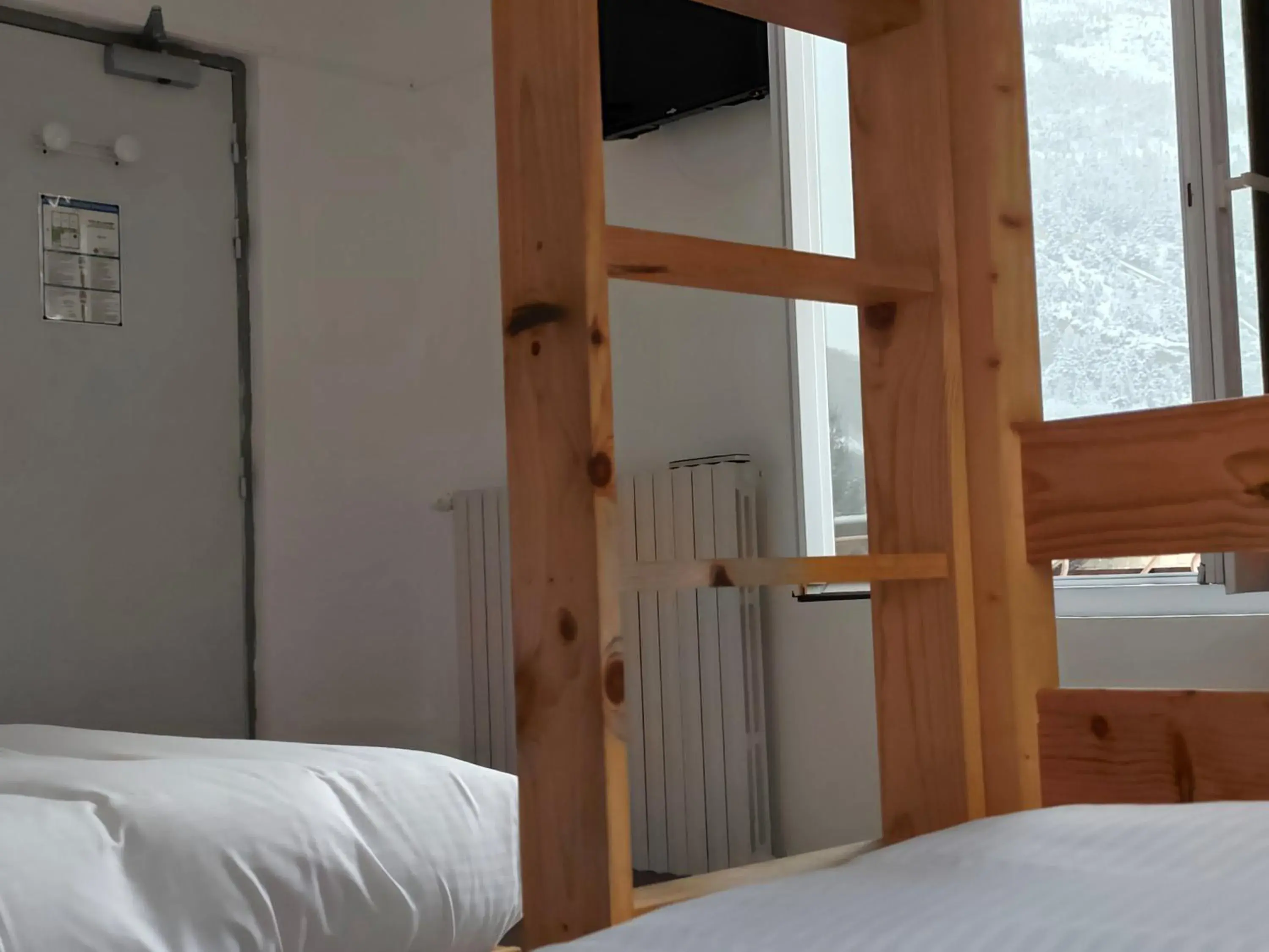 Quadruple Room with Private External Bathroom in Ice Rock Hotel Quadruple Room with Private External Bathroom in Ice Rock Hotel