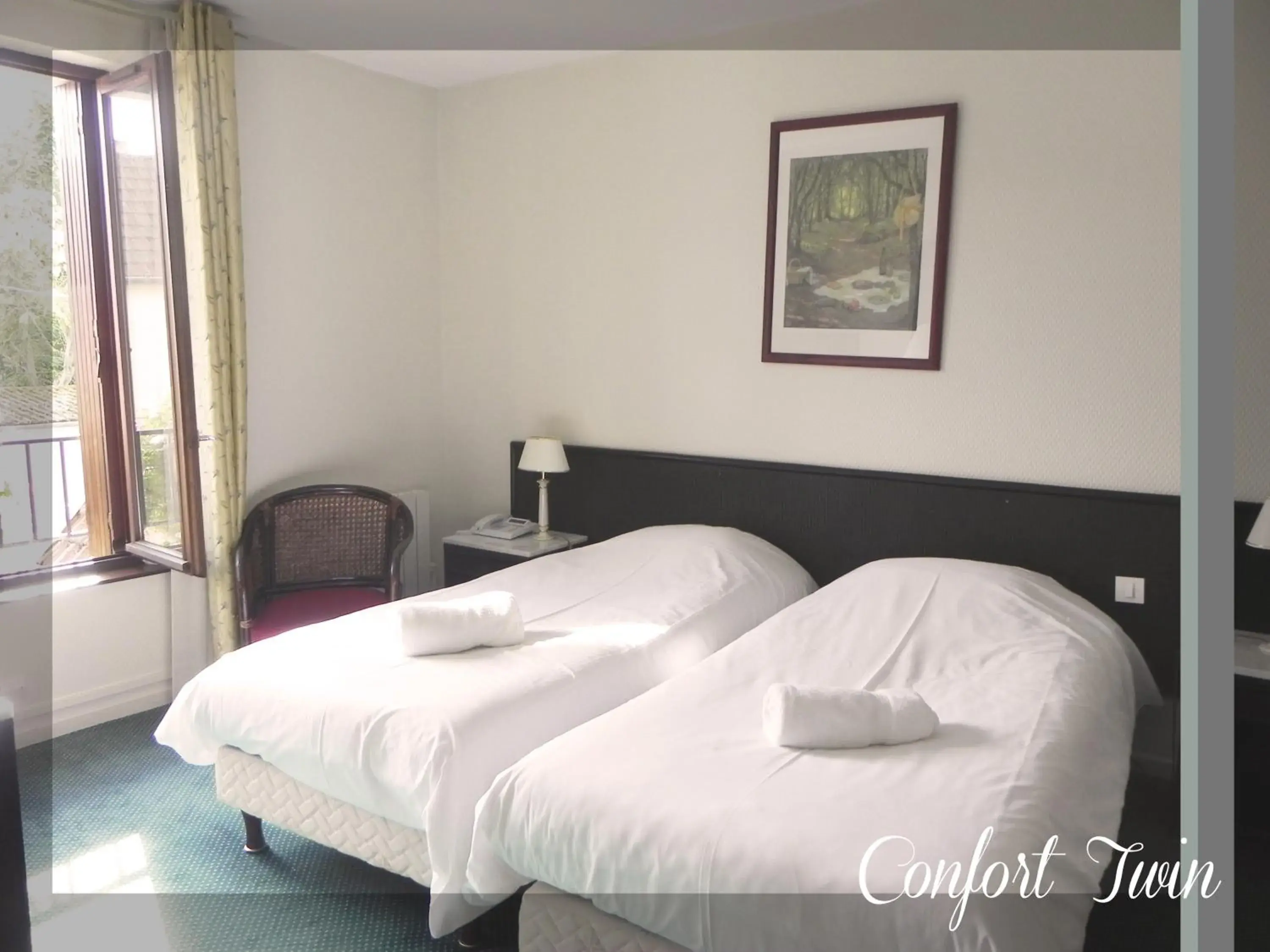 Bed in Logis Le Relais Champenois Bed in Logis Le Relais Champenois