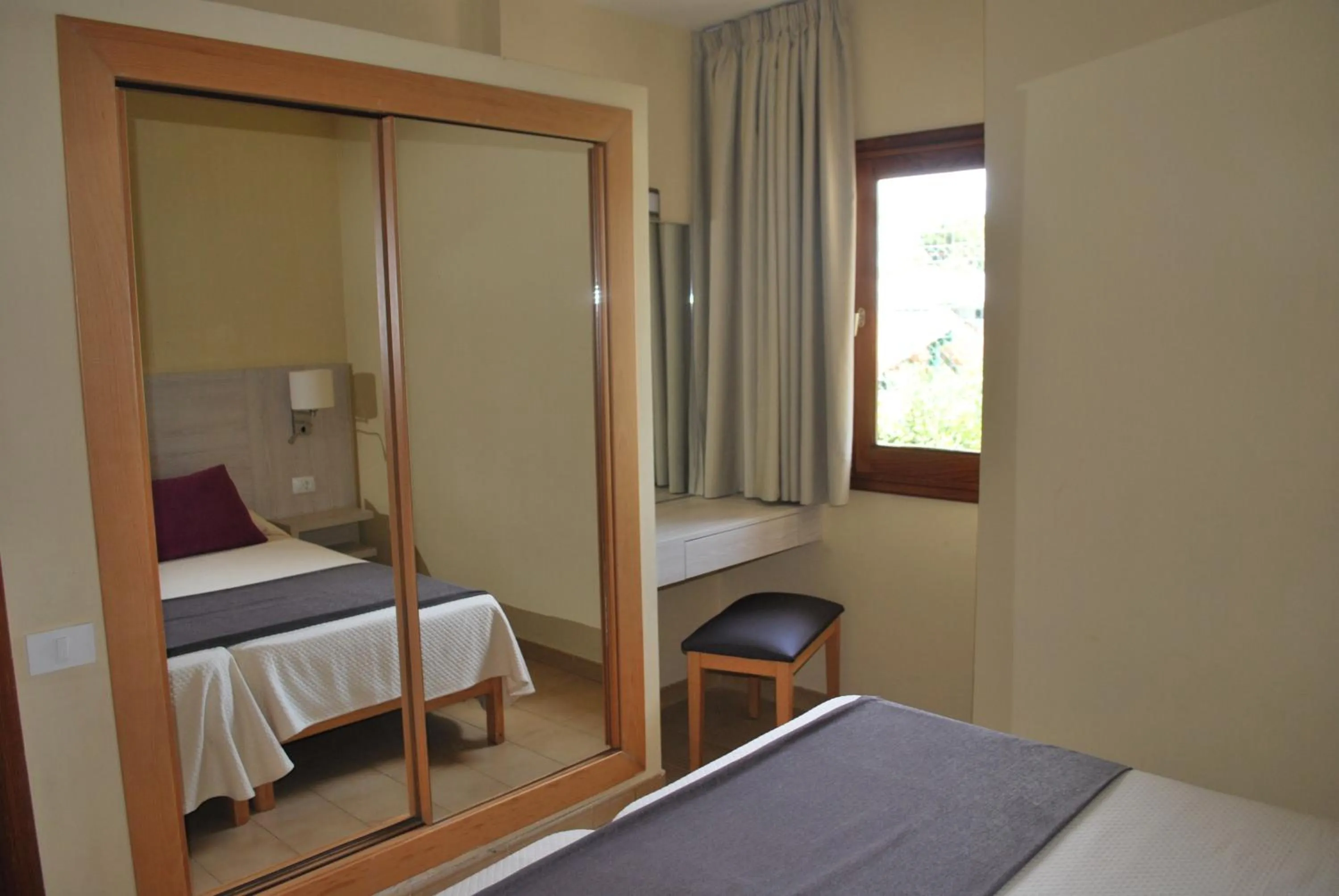 Bedroom, Bed in Bungalows Parque Bali con AIRE ACONDICIONADO