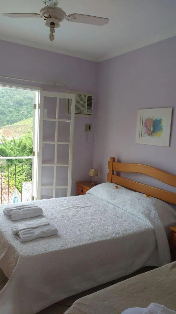 Bed in Pousada D'amoras