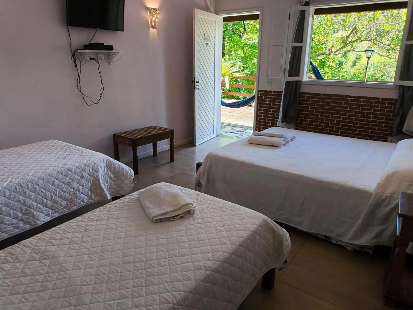 Bed in Pousada D'amoras