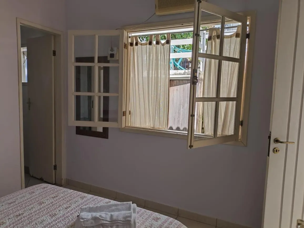 Bed in Pousada D'amoras