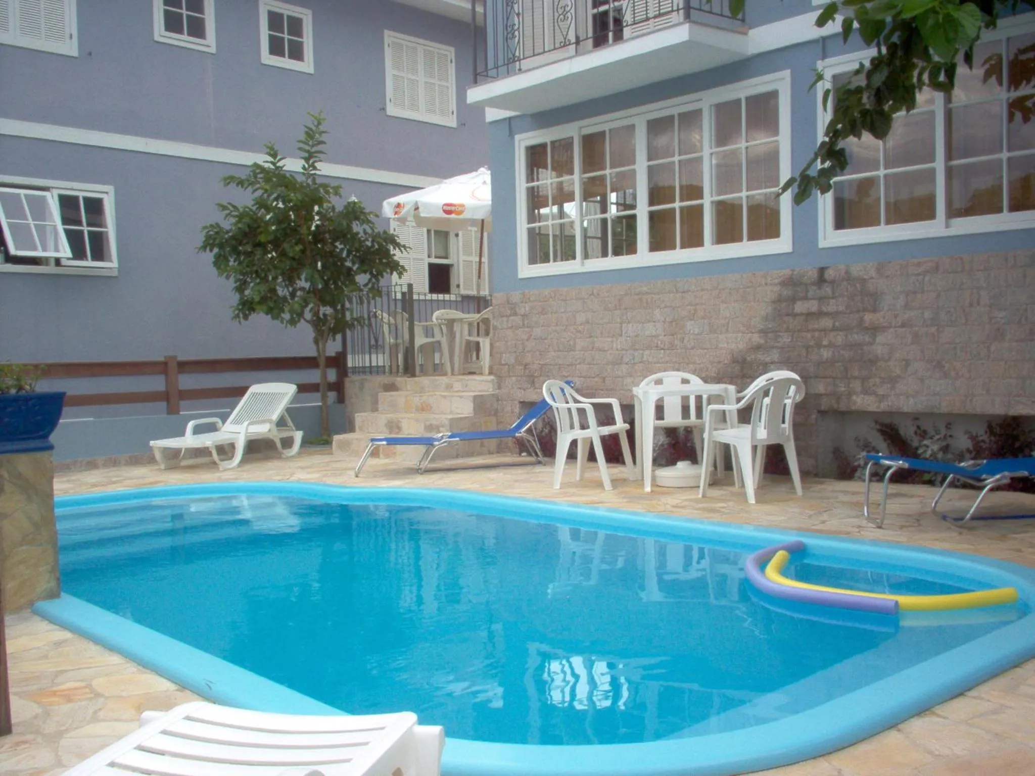 Swimming pool in Pousada D'amoras