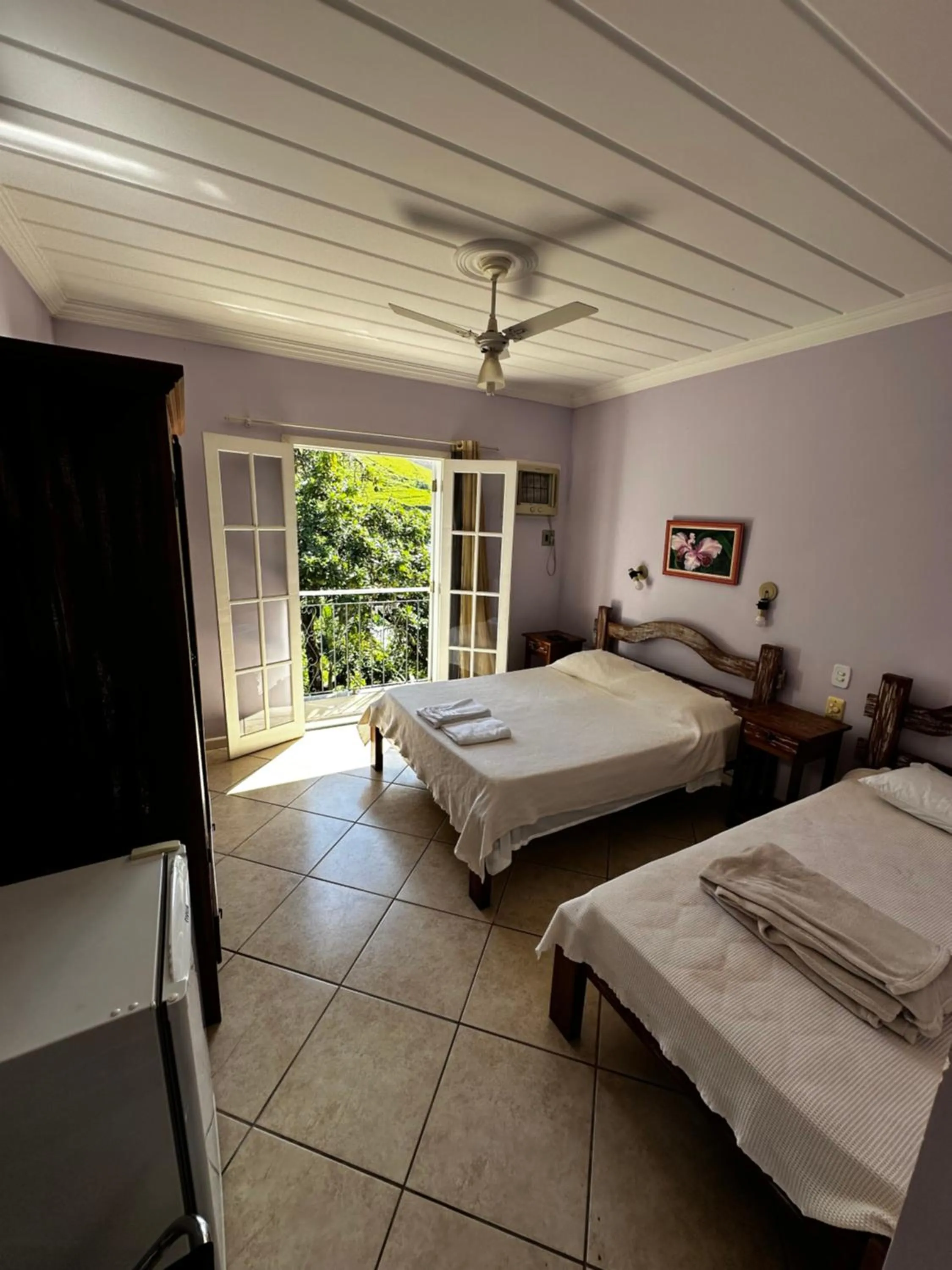 Bed in Pousada D'amoras